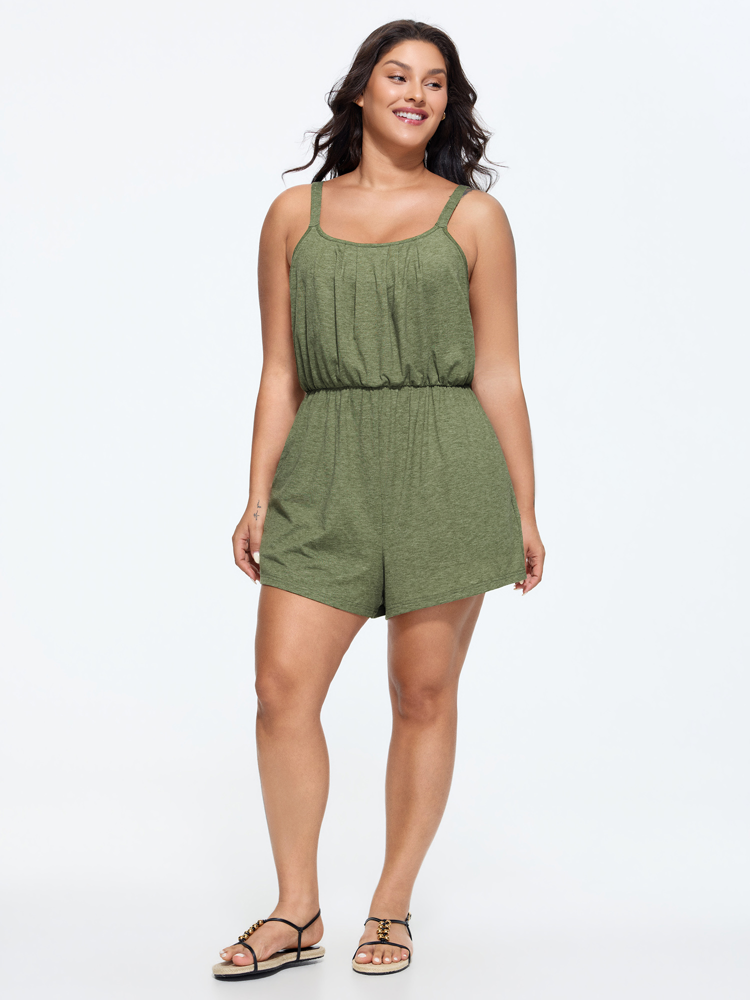 Side view of BloomChic Women's Plus Size Supersoft Adjustable Relaxed-Fit Lounge Romper Sage not graphics short 26/4X