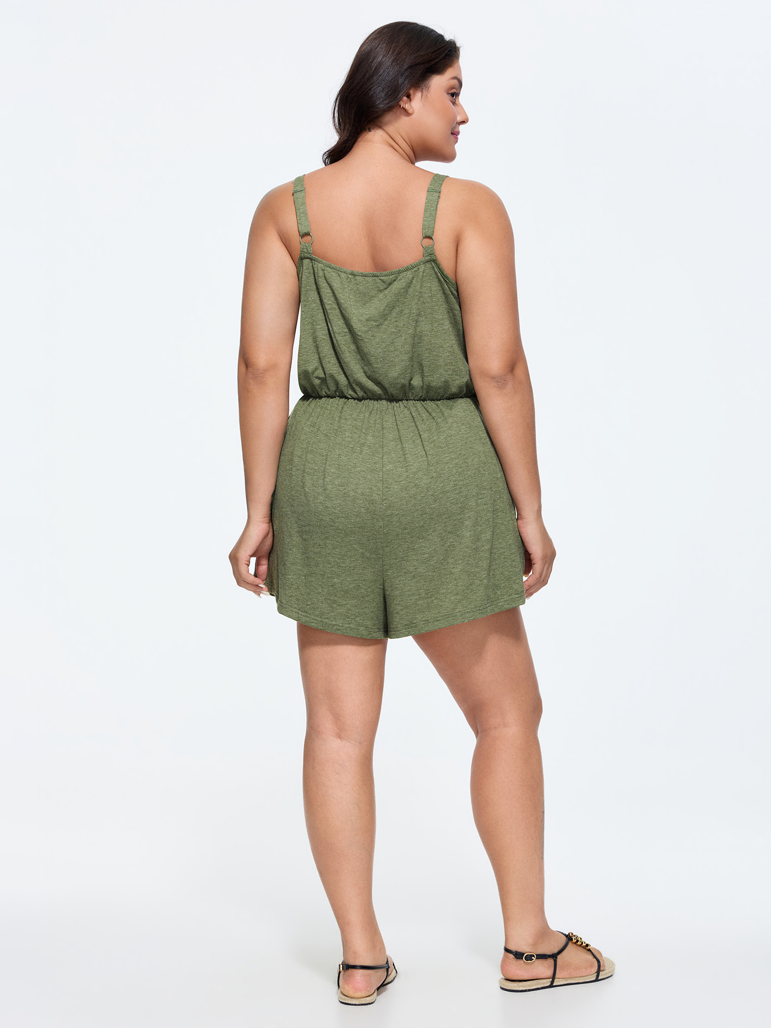 Side view of BloomChic Women's Plus Size Supersoft Adjustable Relaxed-Fit Lounge Romper Sage not graphics short 26/4X