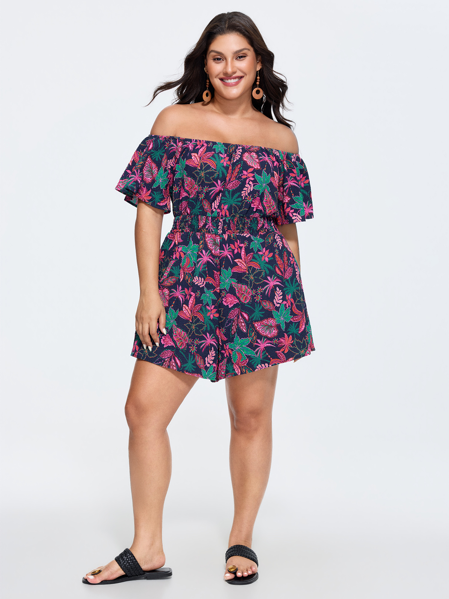Side view of BloomChic Women's Plus Size Floral Print Ruffled Off-Shoulder Romper Multicolor Vacation 12/L