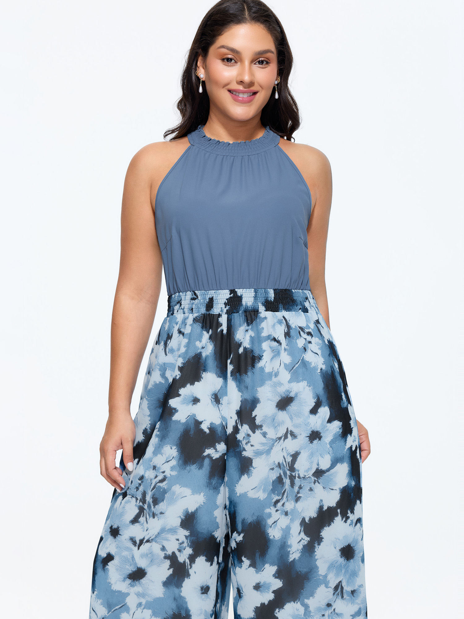Side view of BloomChic Women's Plus Size Floral Print Color Contrast Jumpsuit DarkBlue Elegant Relaxed Fit 30/6X