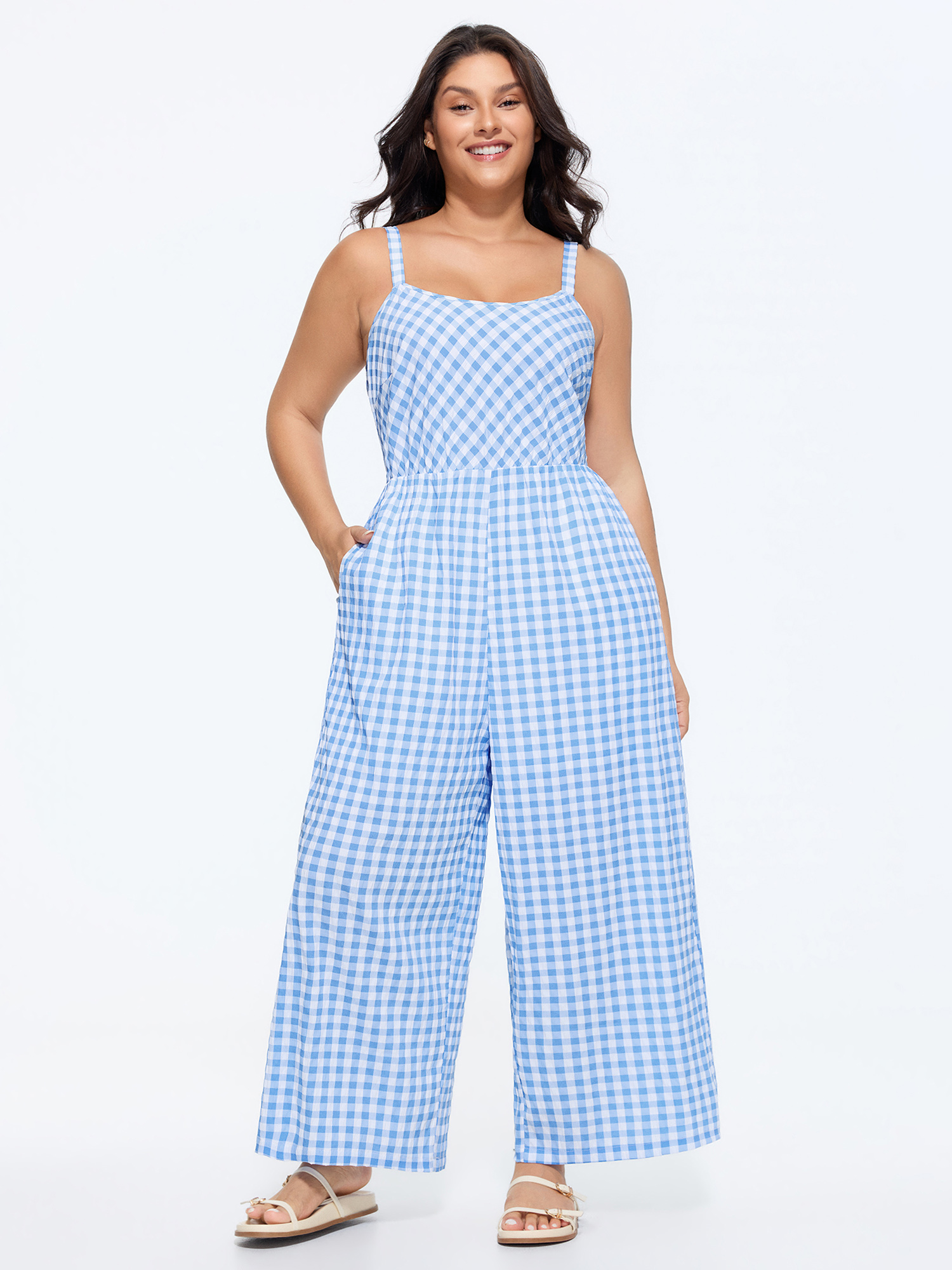 Side view of BloomChic Women's Plus Size Checkered Print Back Bow-Tie Jumpsuit LightBlue Casual 18-20/2X