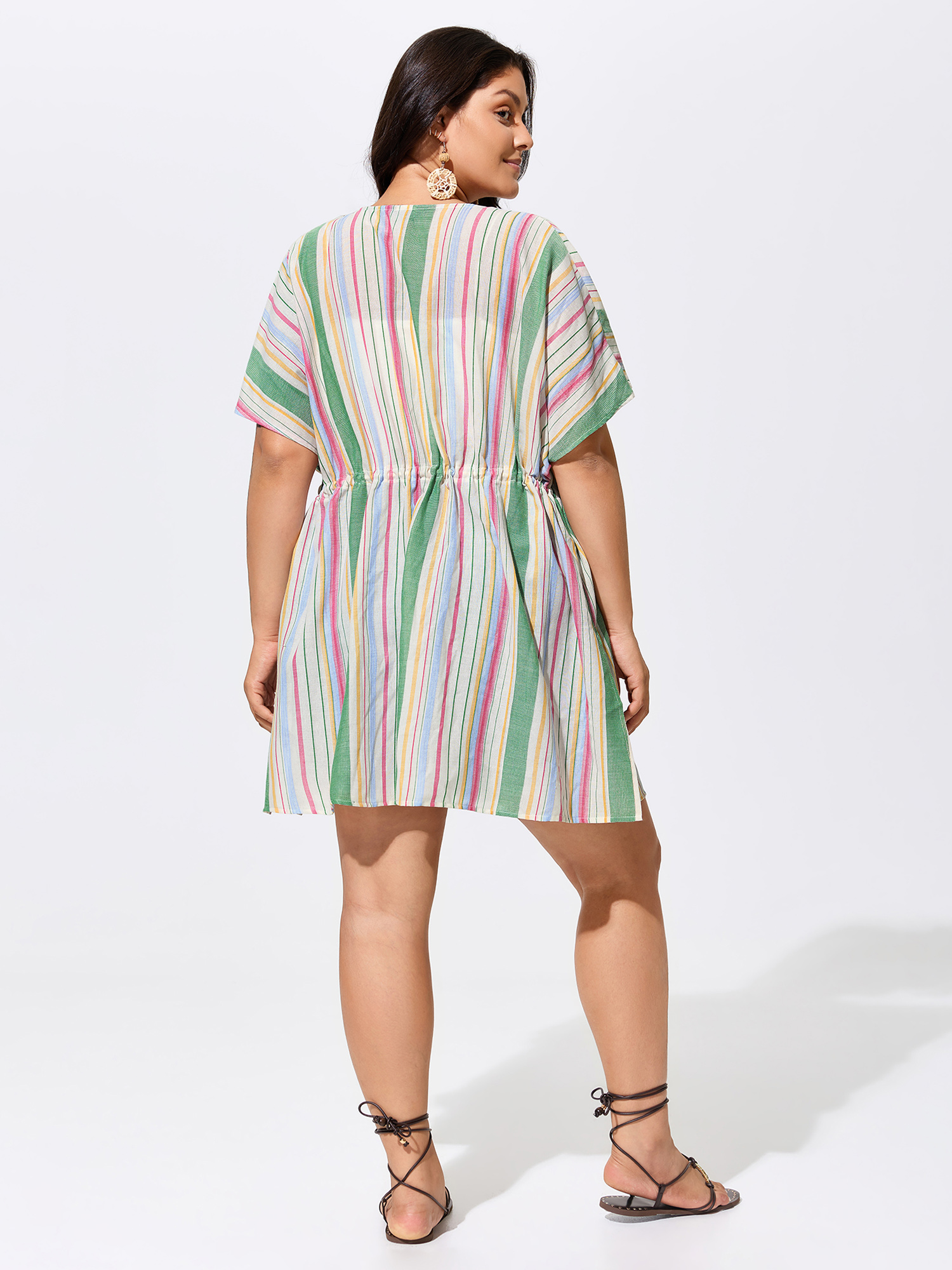 Side view of BloomChic Women's Plus Size Ribbed Front-Tie Breezy Swim Cover-Up Ivory 30/6X