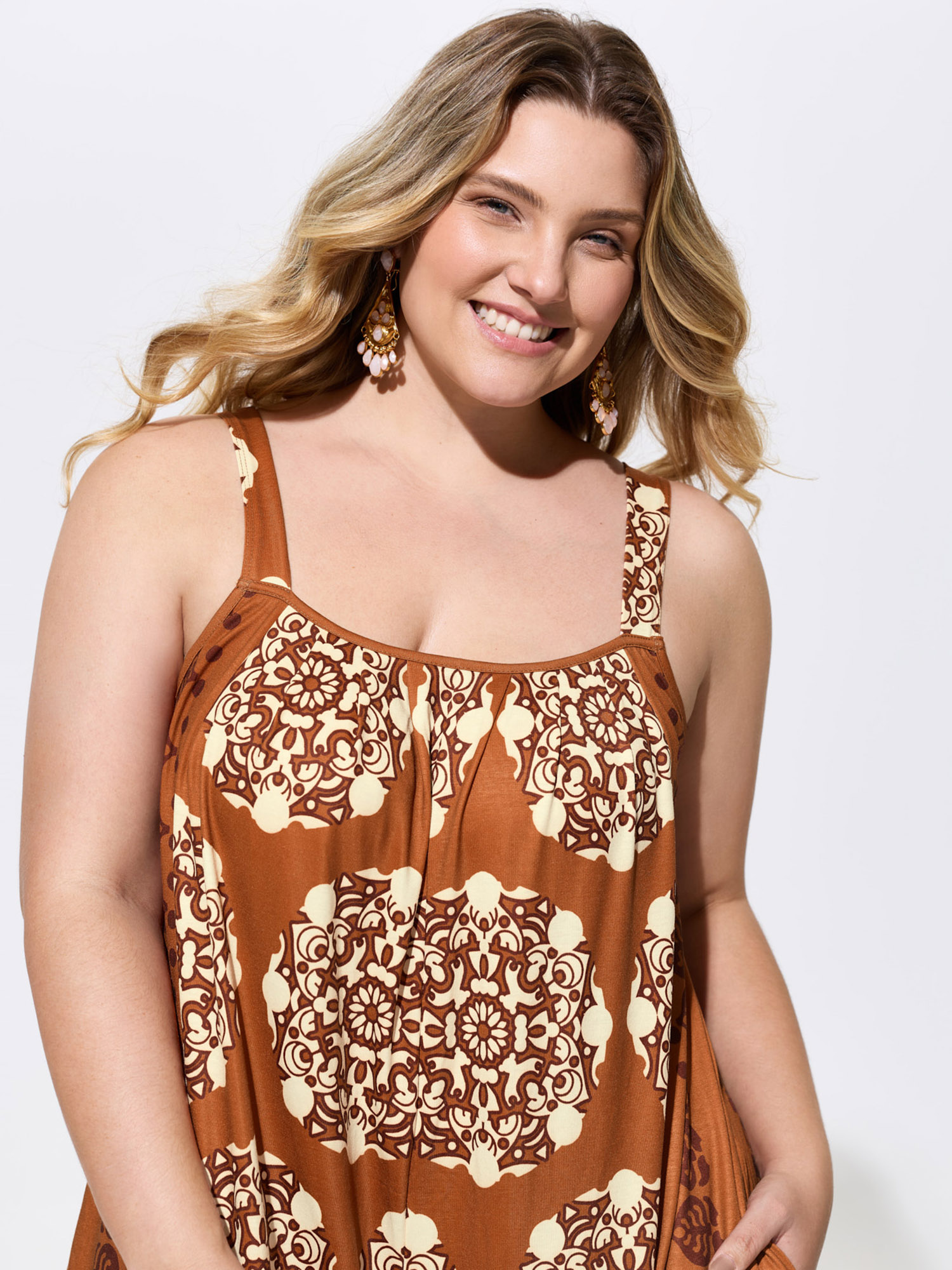 Side view of BloomChic Women's Plus Size Sunkissed Stretchy Adjustable Strap Jumpsuit Yellowishbrown Vacation Baggy 26/4X
