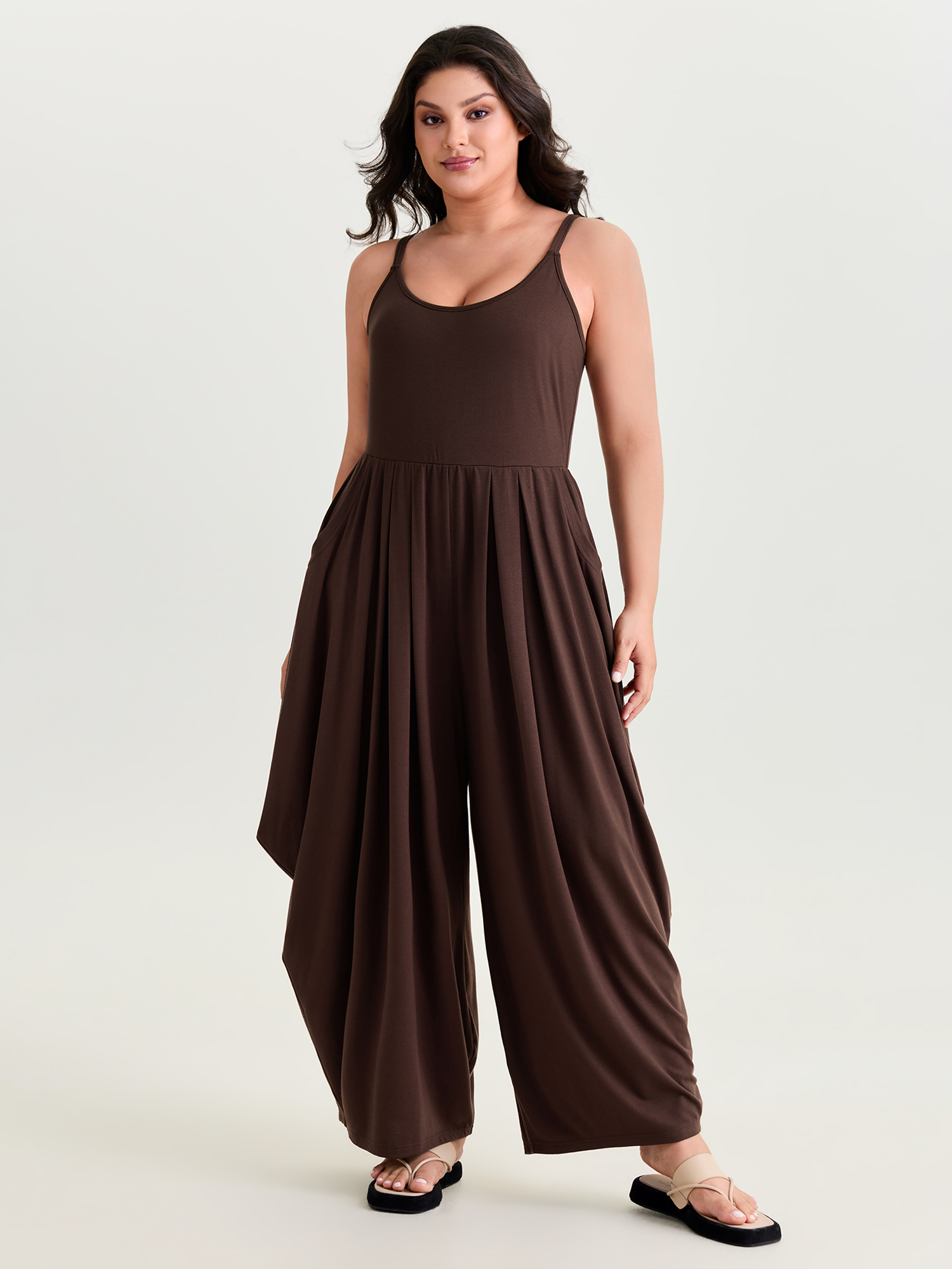 Side view of BloomChic Women's Plus Size Stretchy Scoop Neckline Flowy Jumpsuit Browncoffeecolor Casual Relaxed Fit 22-24/3X