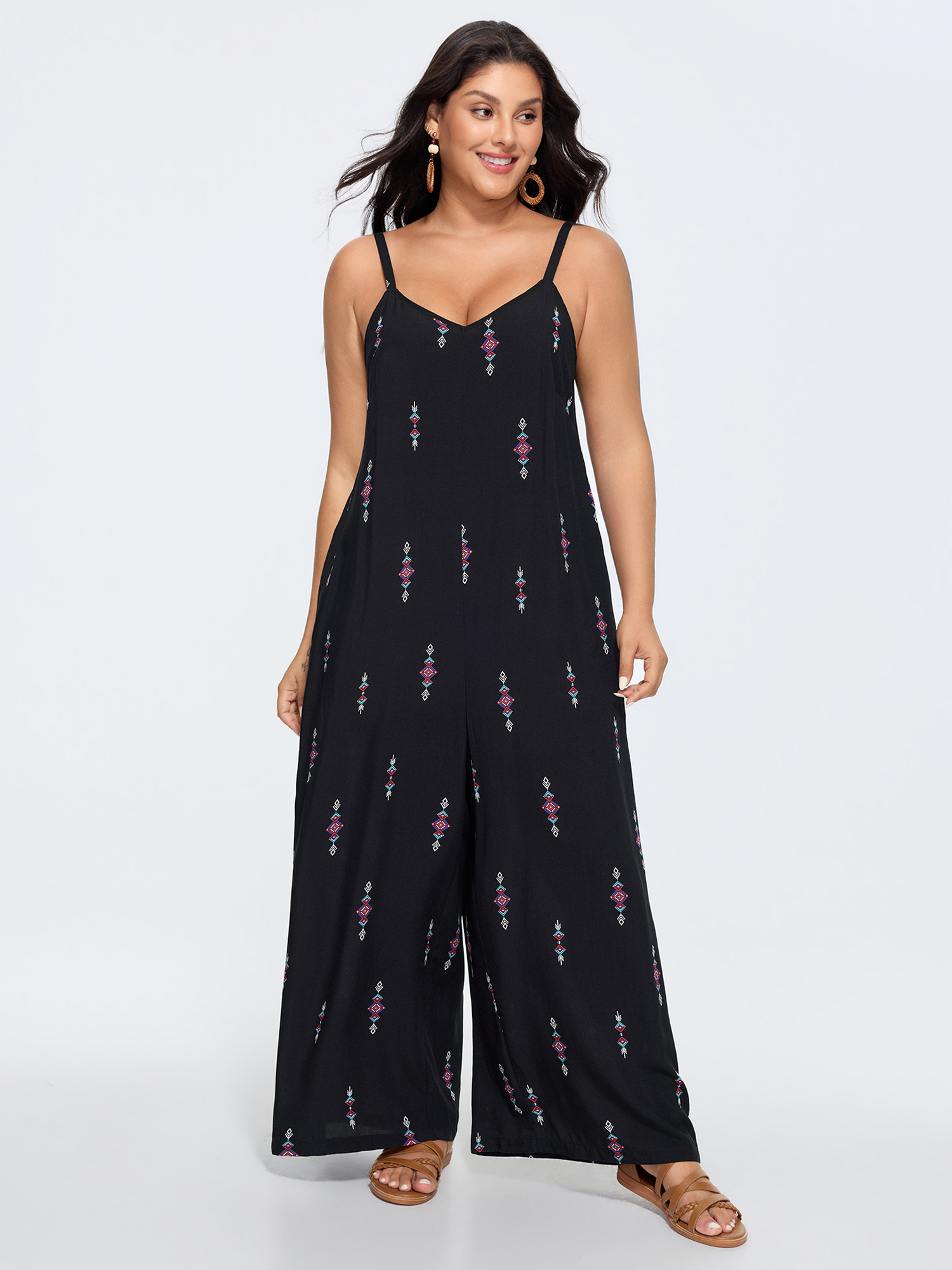 Side view of BloomChic Women's Plus Size Geometric Print Adjustable Backless Drawstring Jumpsuit Black Vacation 22-24/3X
