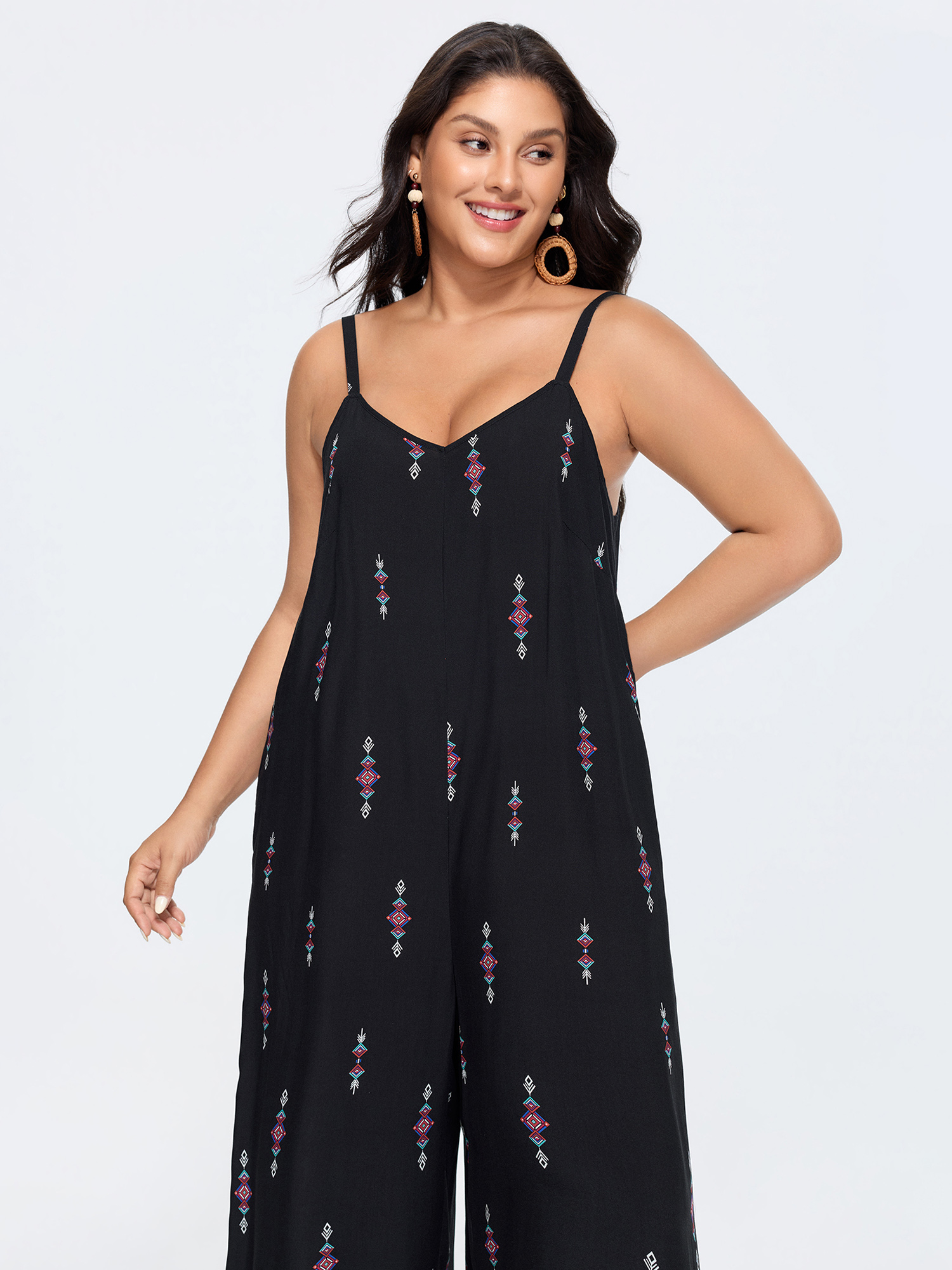 Side view of BloomChic Women's Plus Size Geometric Print Adjustable Backless Drawstring Jumpsuit Black Vacation 22-24/3X