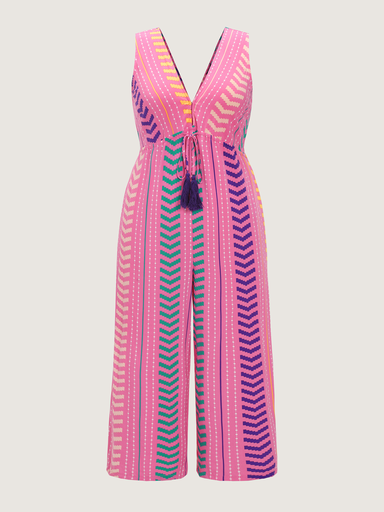 Side view of BloomChic Women's Plus Size Colorful Geometric Print Tassel Jumpsuit Peach Vacation 30/6X