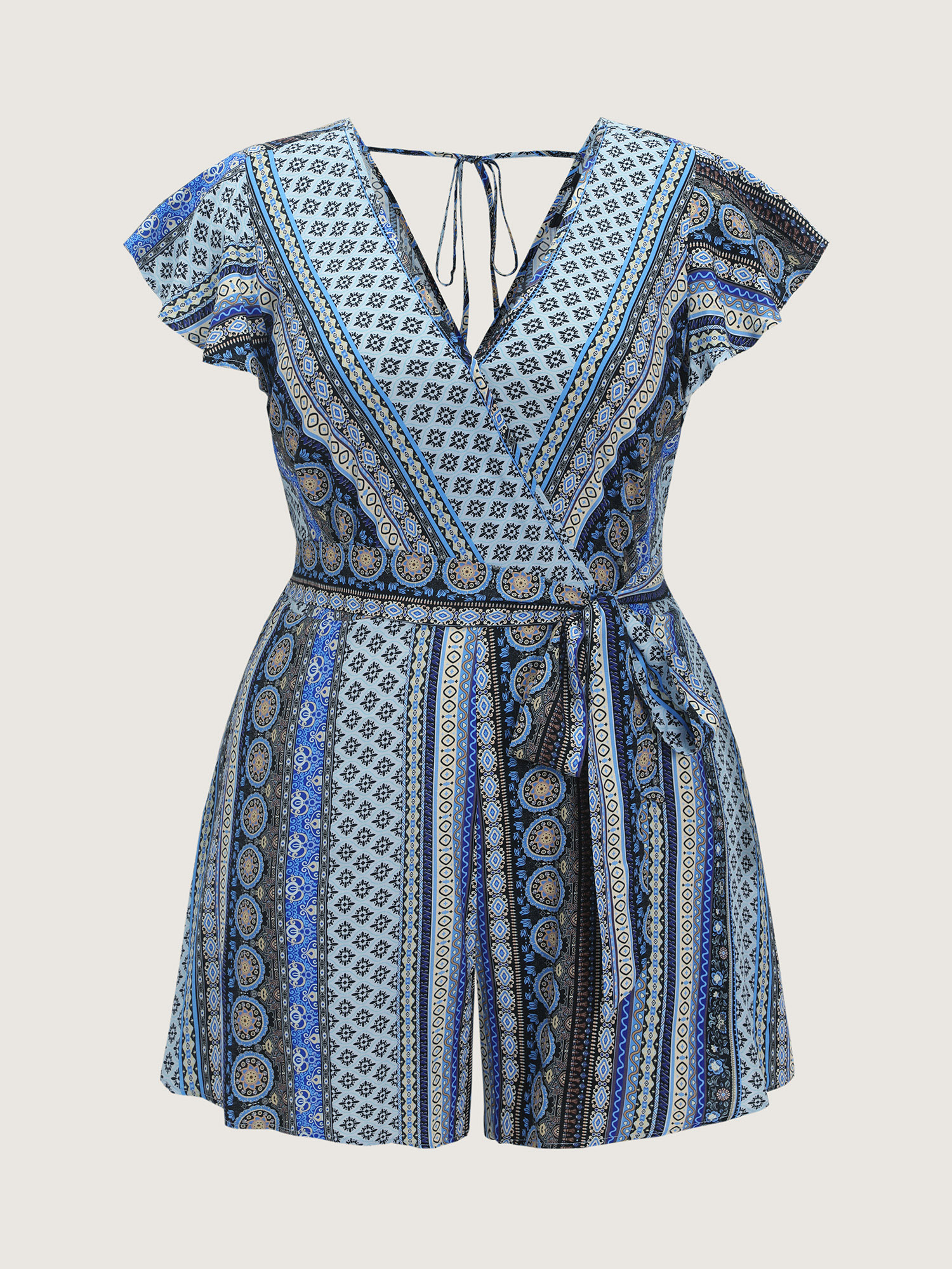 Side view of BloomChic Women's Plus Size Boho Striped Print Back-Tie Romper Multicolor Vacation 22-24/3X