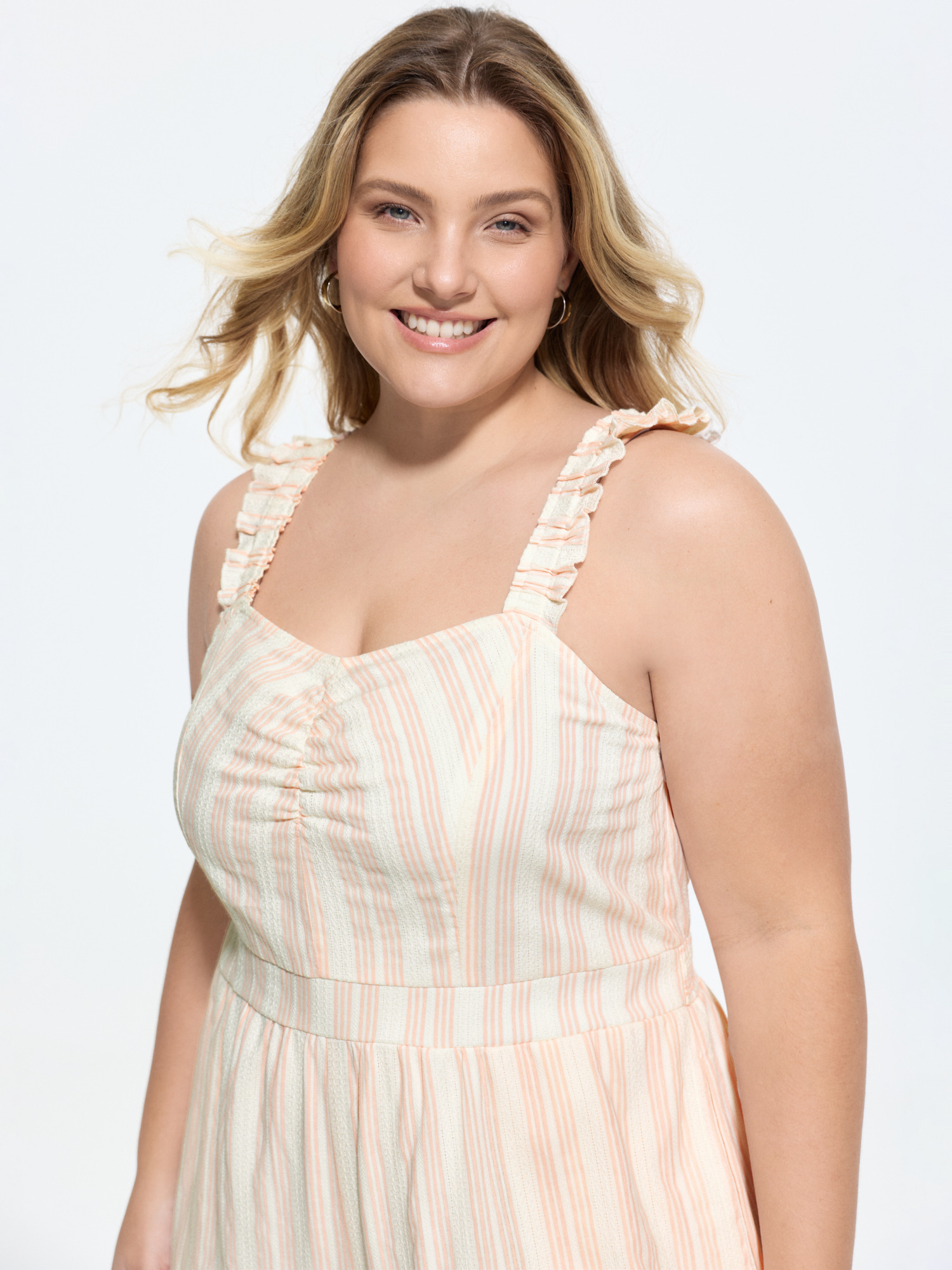 Side view of BloomChic Women's Plus Size Sheer Striped Print Shirred Straps Jumpsuit MistyRose Casual 12/L