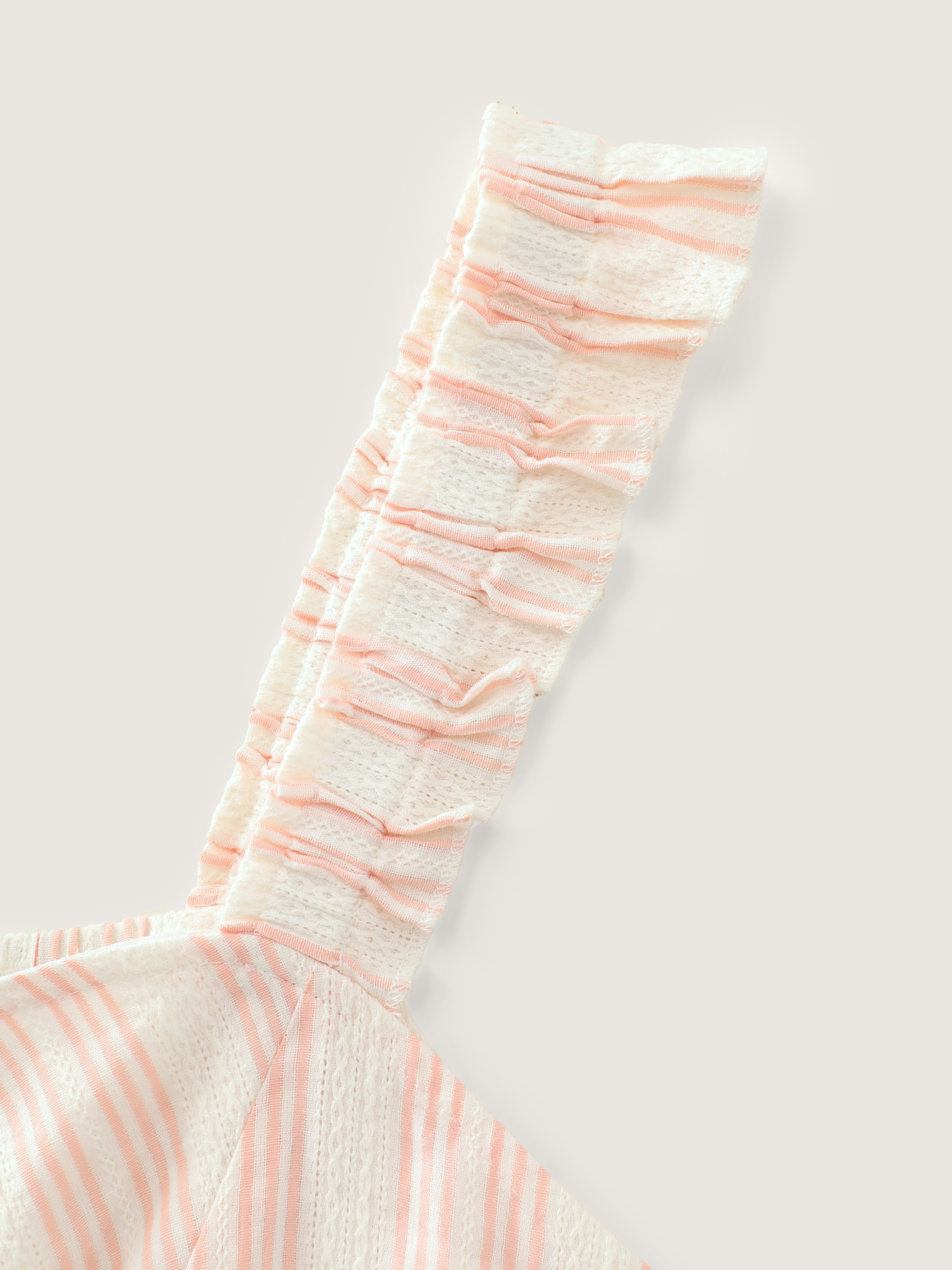 Side view of BloomChic Women's Plus Size Sheer Striped Print Shirred Straps Jumpsuit MistyRose Casual 12/L