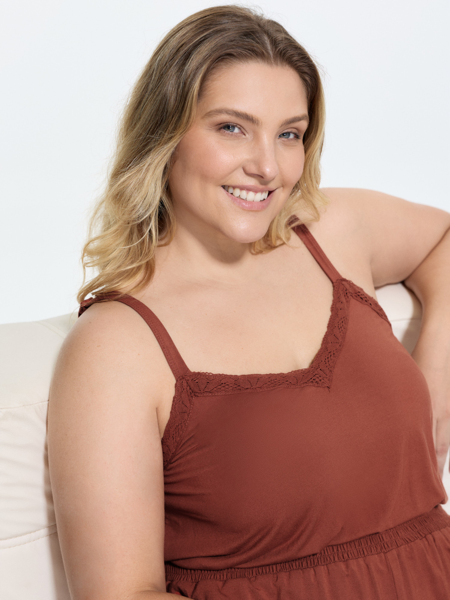 Side view of BloomChic Women's Plus Size Supersoft Lace Detail Lounge Romper Rust not graphics short 14-16/1X