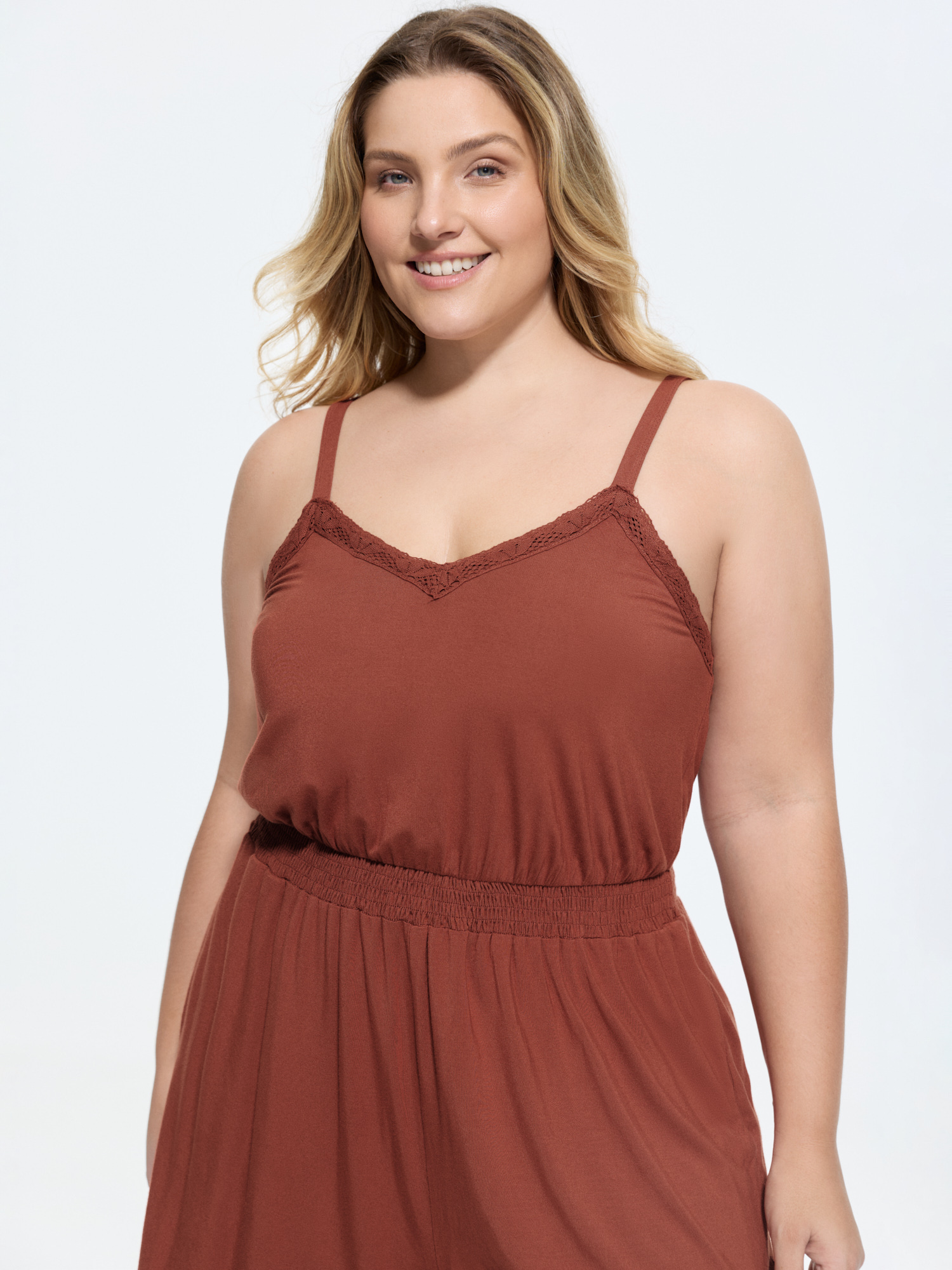 Side view of BloomChic Women's Plus Size Supersoft Lace Detail Lounge Romper Rust not graphics short 14-16/1X
