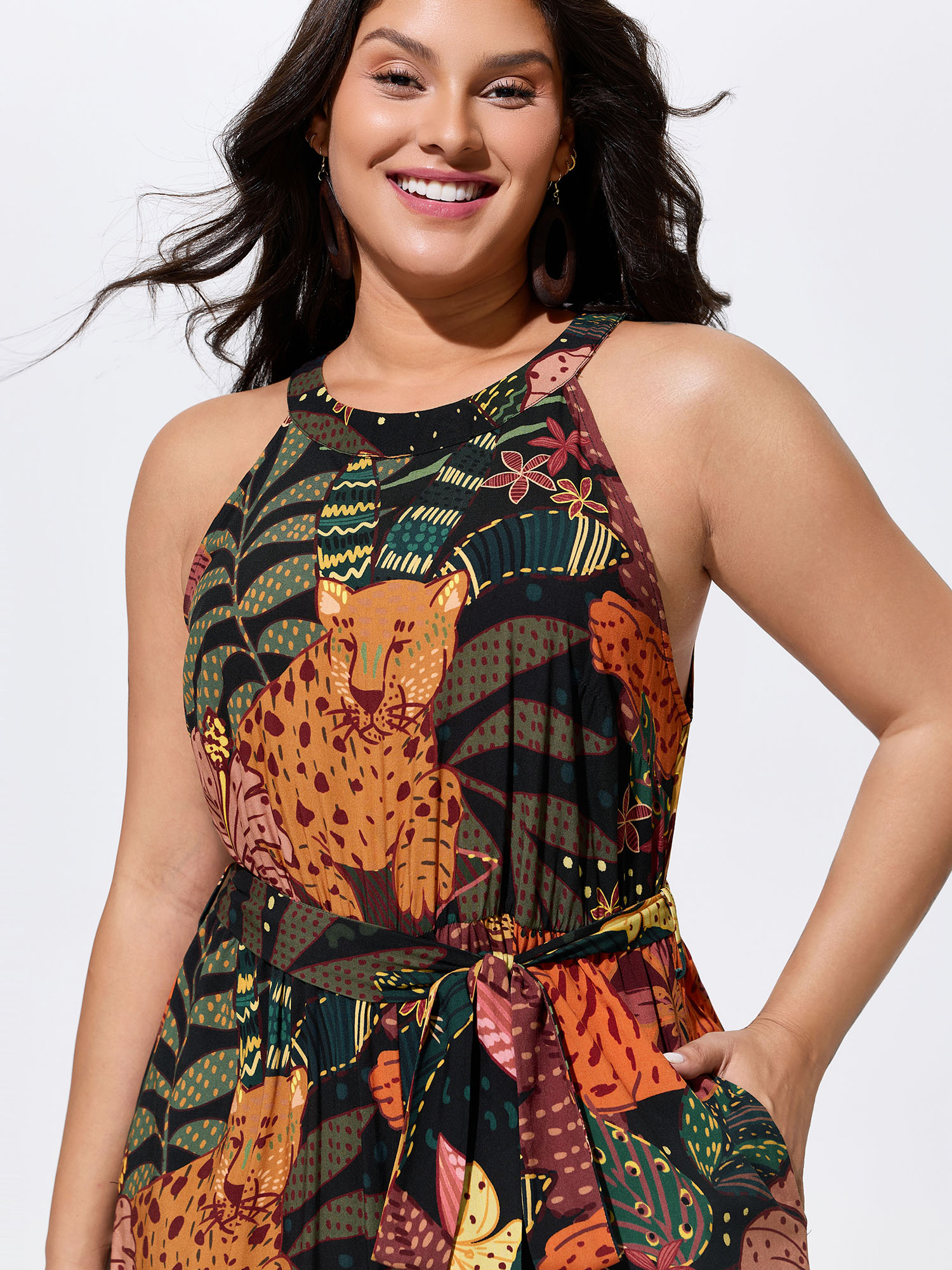 Side view of BloomChic Women's Plus Size Wild Print Halter Neckline Sleeveless Jumpsuit Multicolor Vacation 22-24/3X