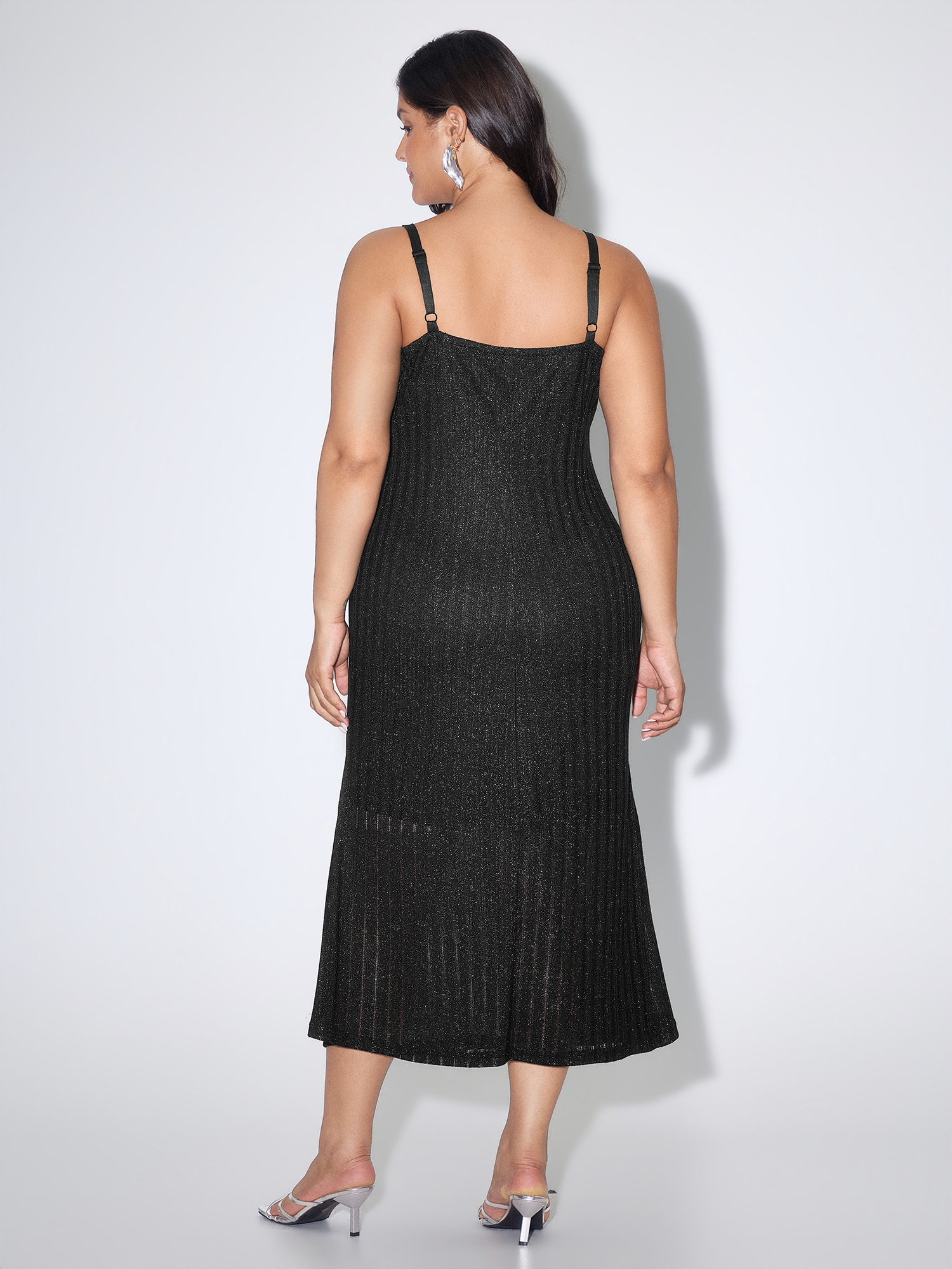 Side view of BloomChic Women's Plus Size Shimmer Ribbed Gold Charm Detail Midi Dress Black Party Maxi Sweetheart Neck 30/6X