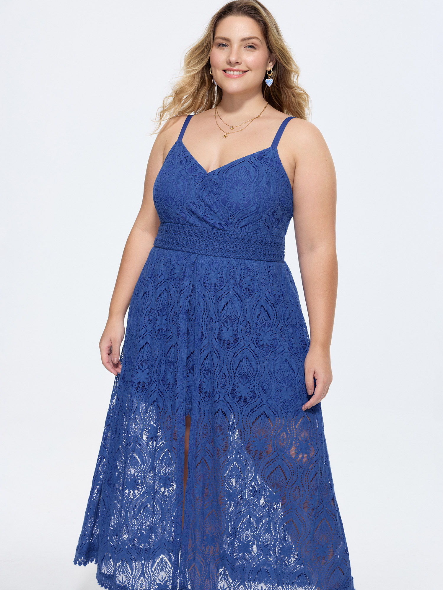 Side view of BloomChic Women's Plus Size Lace Textured Shirred Flowy Romper Navy Vacation 22-24/3X