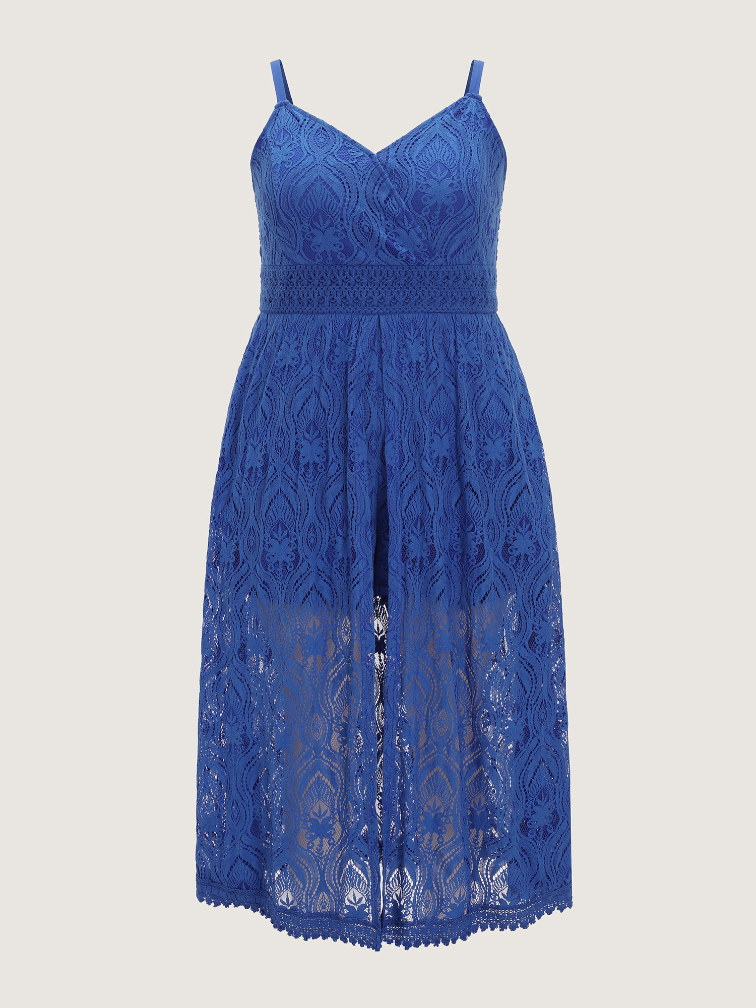 Side view of BloomChic Women's Plus Size Lace Textured Shirred Flowy Romper Navy Vacation 22-24/3X