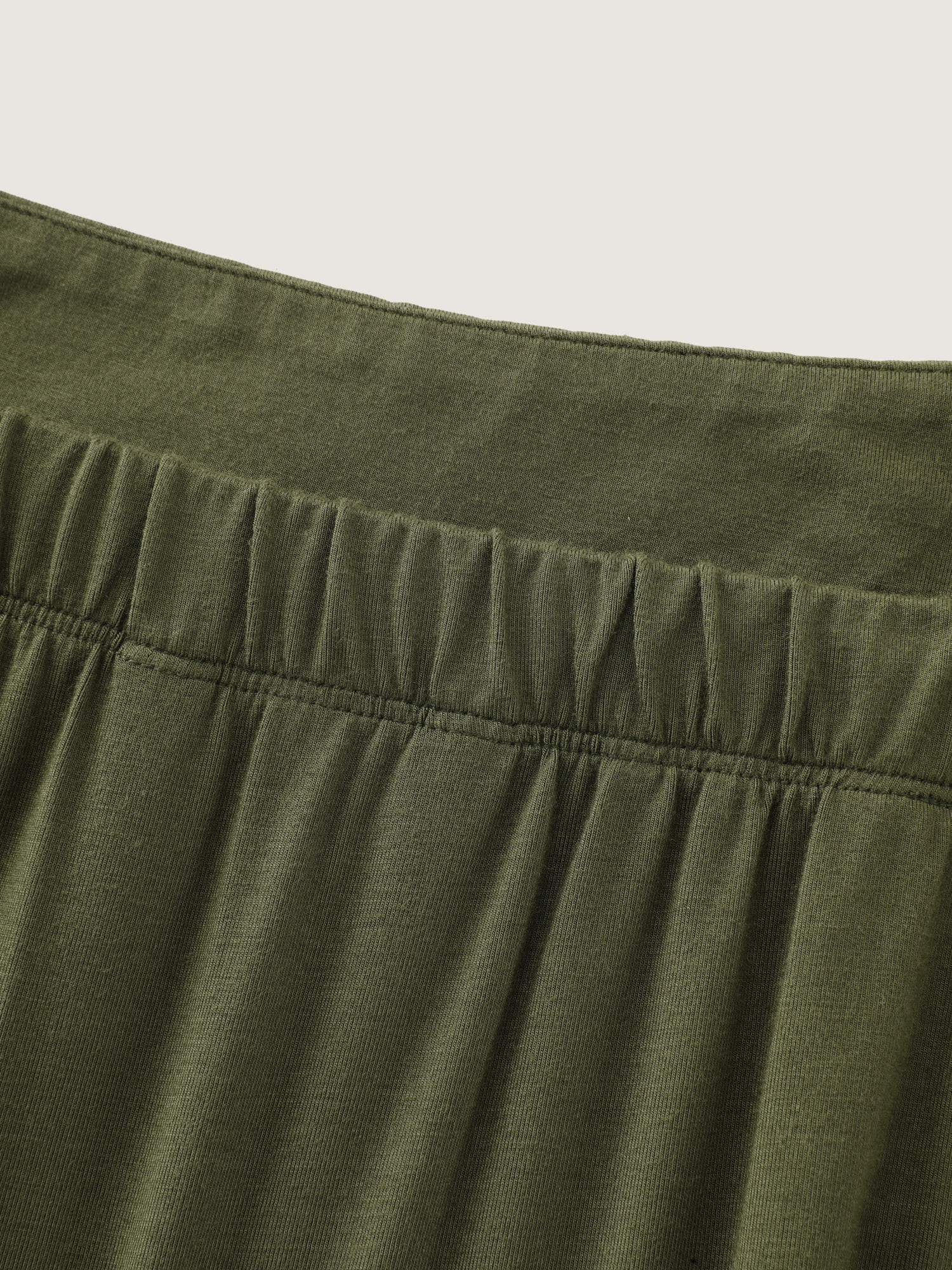 Side view of BloomChic Women's Plus Size Supersoft Tiered Square Neckline Romper ArmyGreen Casual 28/5X