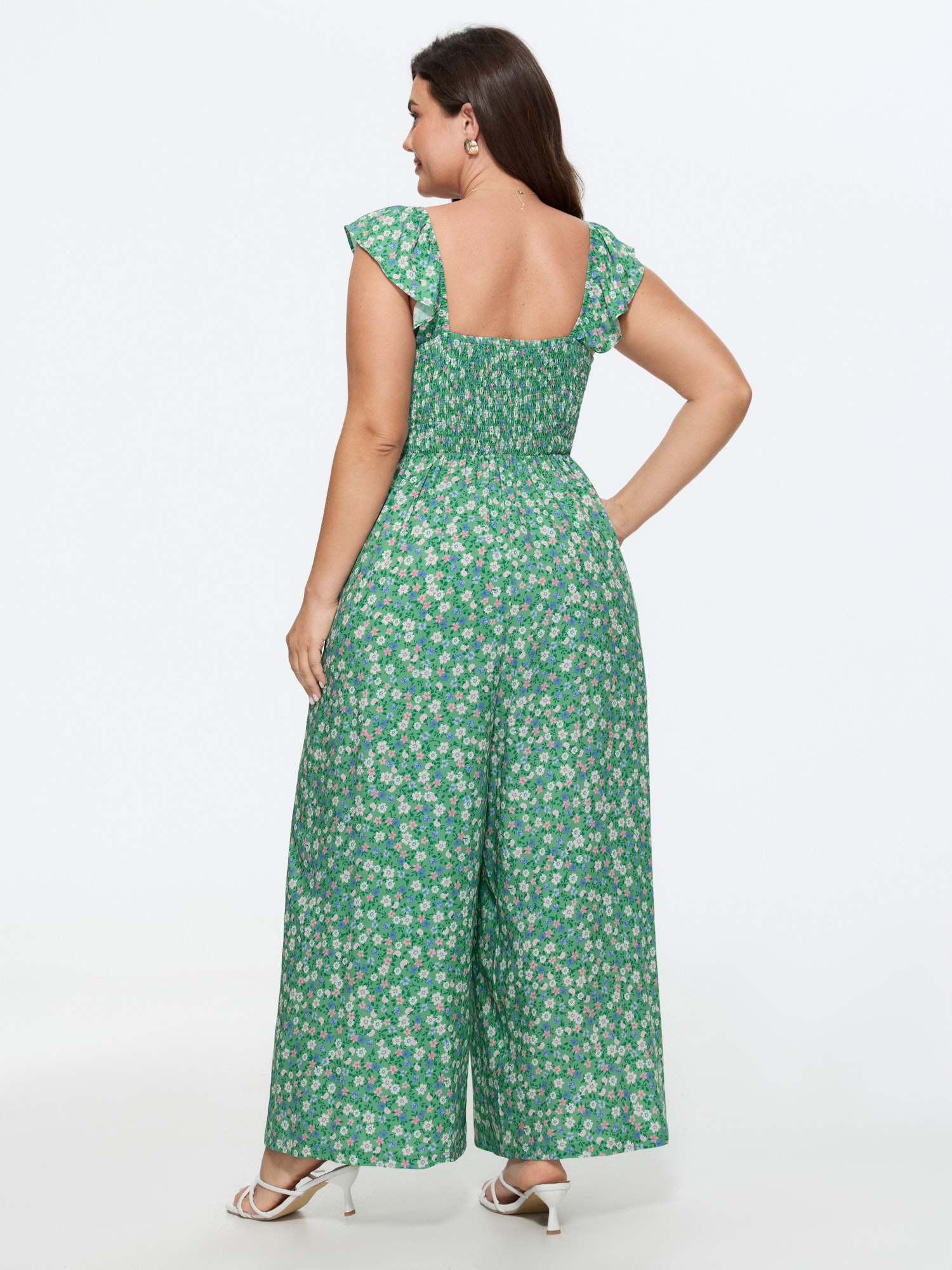 Side view of BloomChic Women's Plus Size Floral Print Ruffled Straps Jumpsuit Greenbean Elegant 18-20/2X