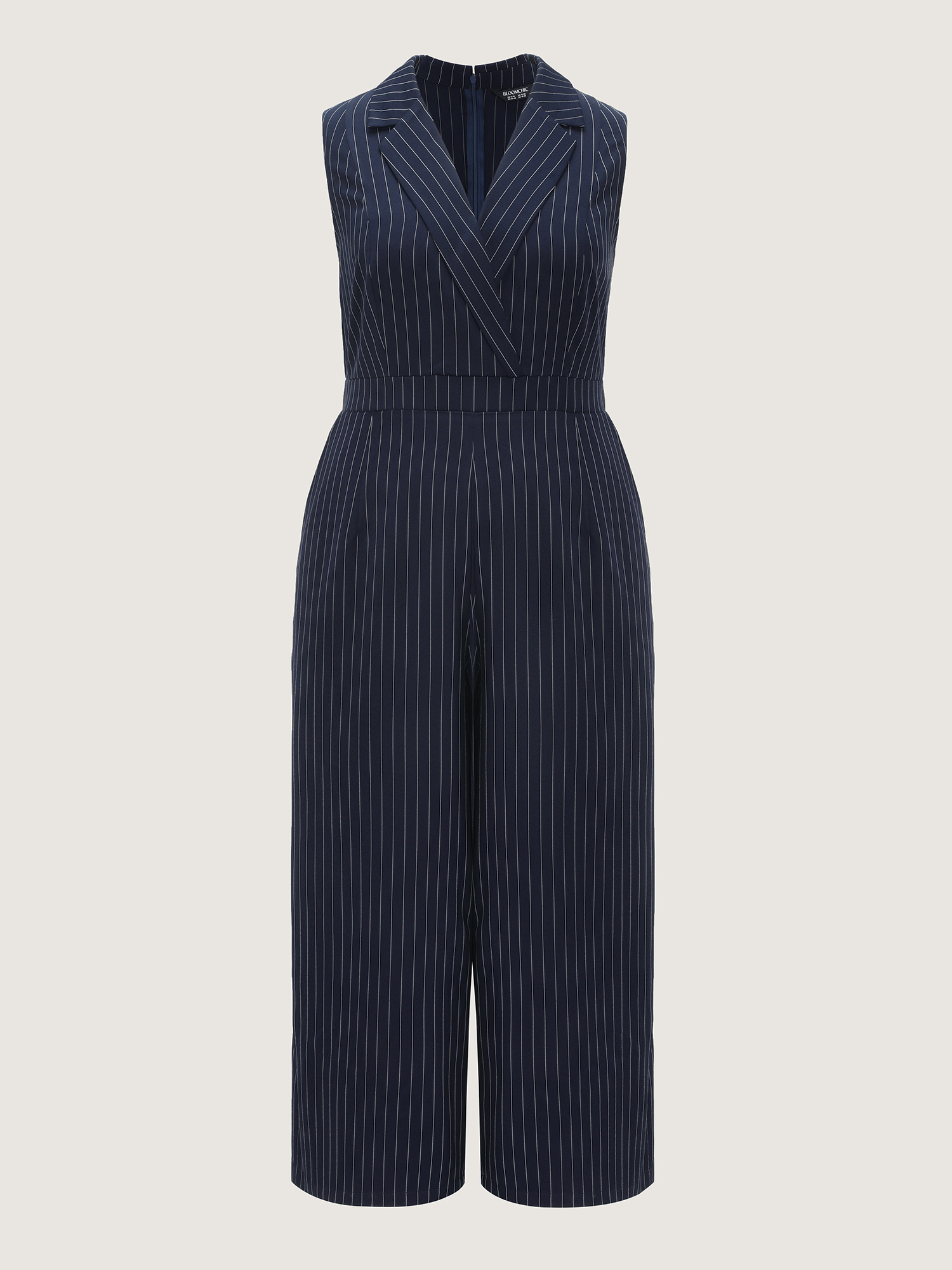 Side view of BloomChic Women's Plus Size Striped Print Collared Sleeveless Jumpsuit Indigo Office Fitted 12/L