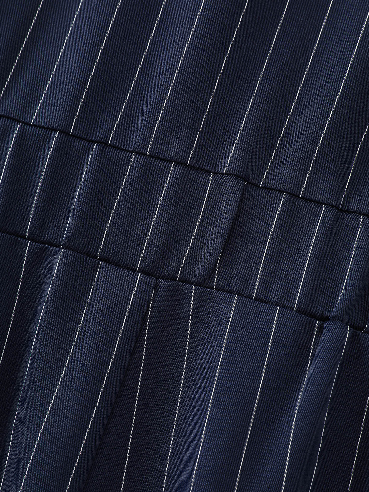 Side view of BloomChic Women's Plus Size Striped Print Collared Sleeveless Jumpsuit Indigo Office Fitted 12/L