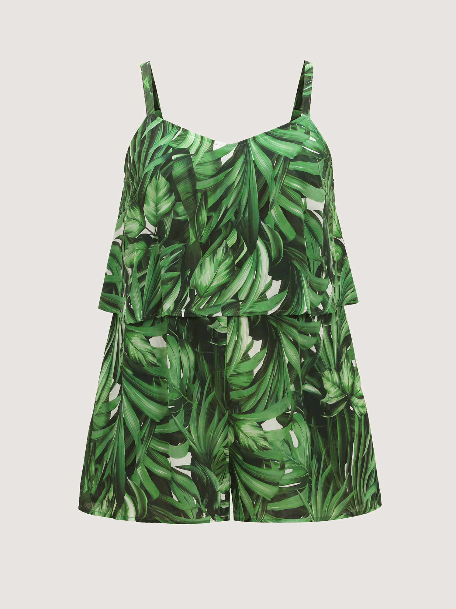 Side view of BloomChic Women's Plus Size Tropical Print Wide-Leg Breezy Romper Truegreen Vacation 10/M