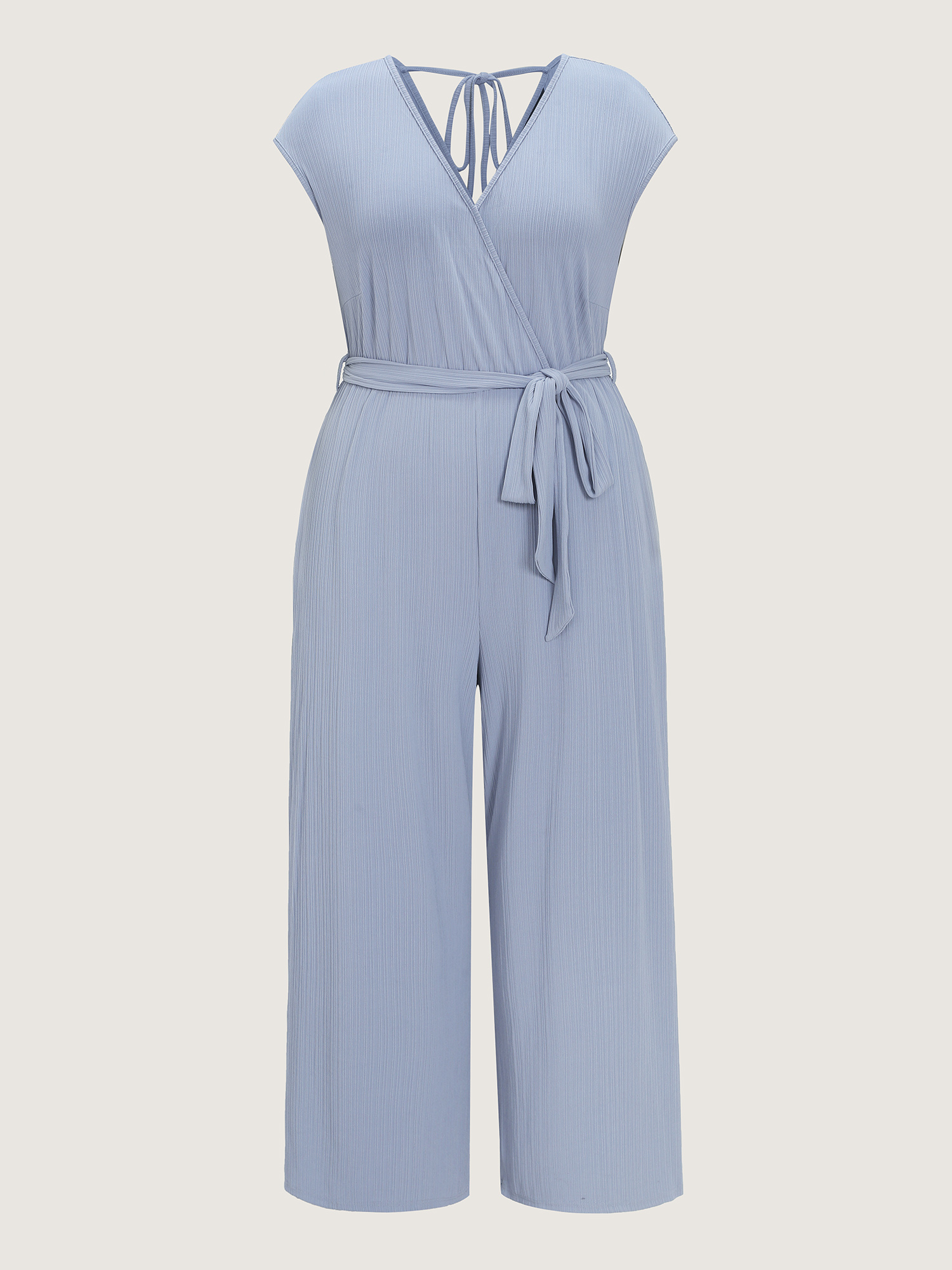 Side view of BloomChic Women's Plus Size Textured Waist Side-Tie Wide-Leg Jumpsuit Stone Elegant 22-24/3X