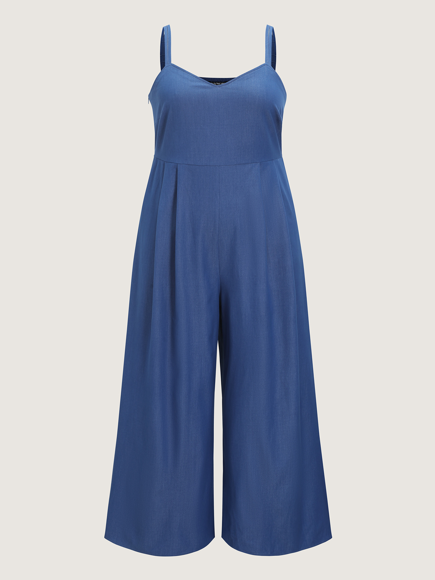 Side view of BloomChic Women's Plus Size Supersoft Pleated Sleeveless Faux Denim Jumpsuit Mediumblue Casual 10/M