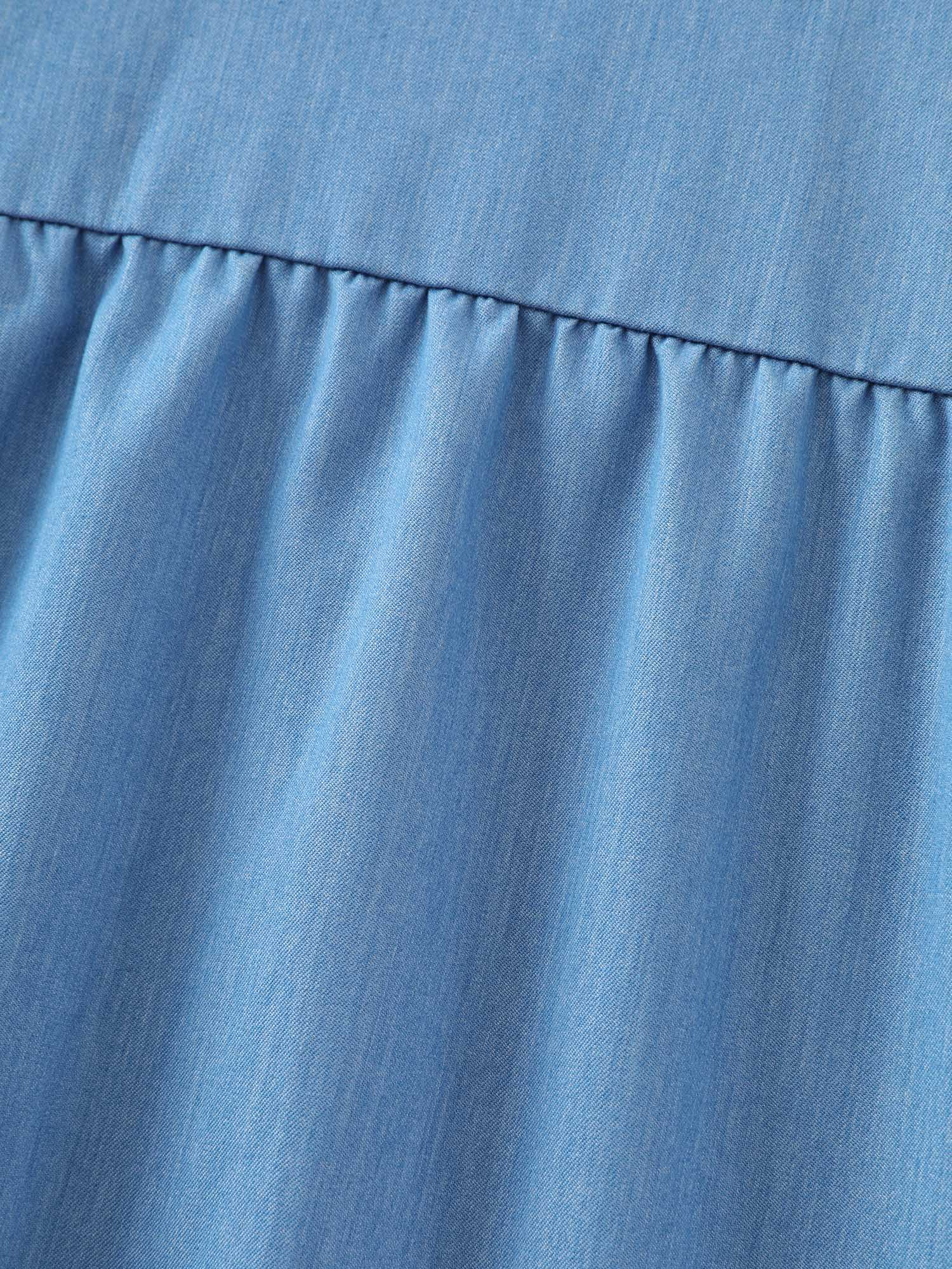 Side view of BloomChic Women's Plus Size Supersoft Button Detail Shirred Waist Faux Denim Jumpsuit Cerulean Casual 14-16/1X