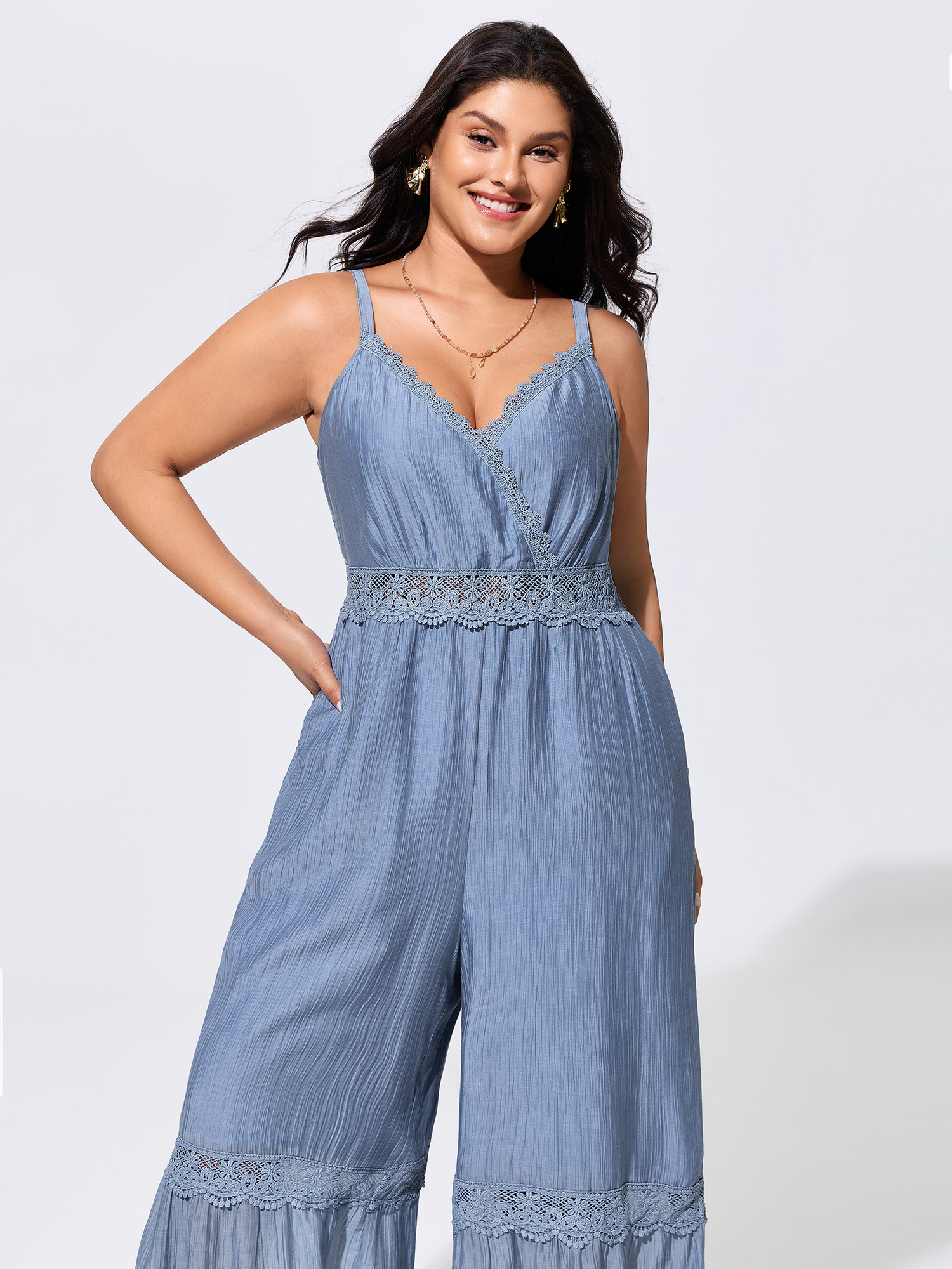 Side view of BloomChic Women's Plus Size Shirred Lace Detail Wide-Leg Jumpsuit Stone Vacation Fitted 26/4X