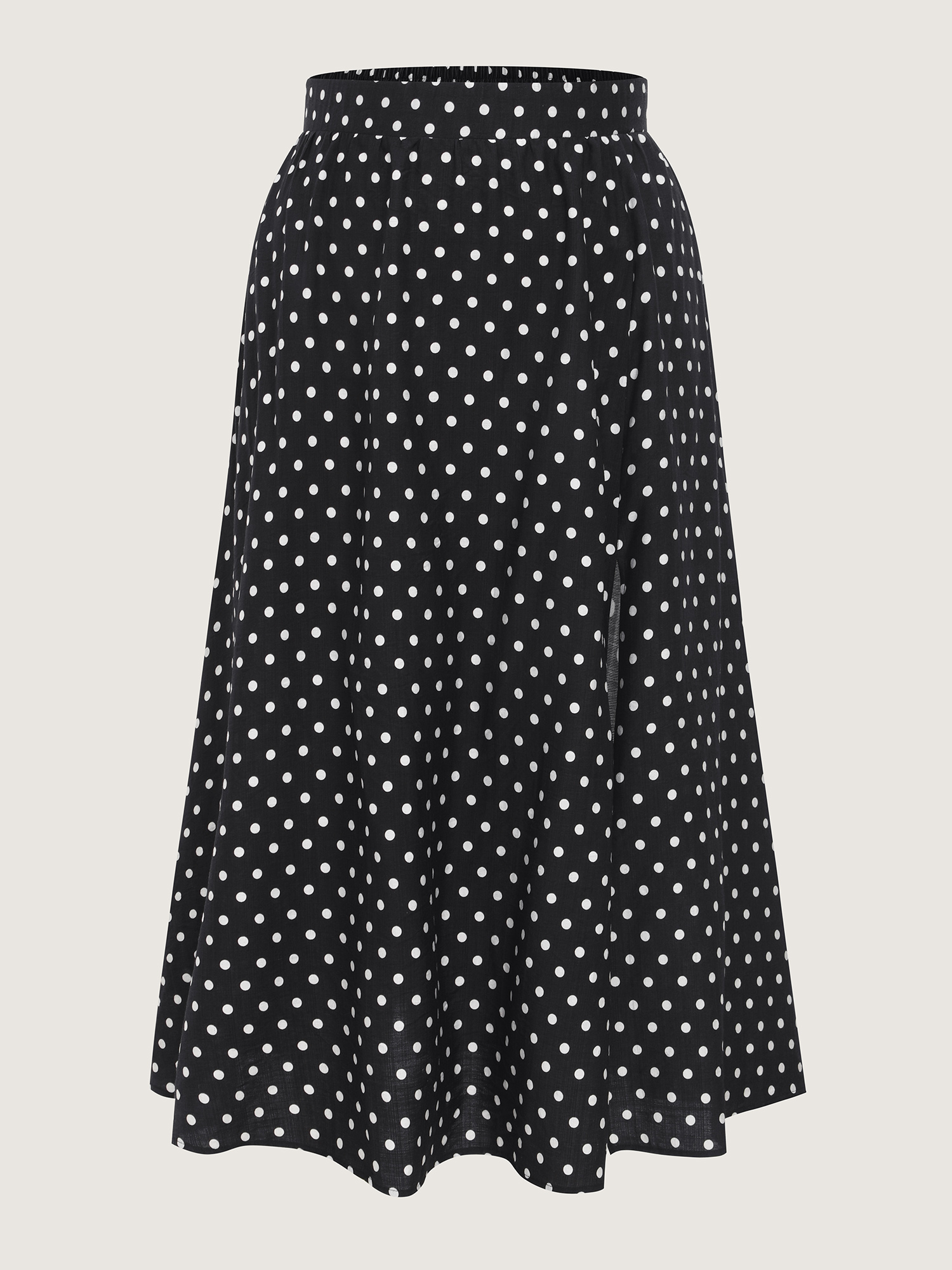 Side view of BloomChic Women's Plus Size Polka Dots Charm Maxi Skirt Black Non Flared Elegant 30/6X