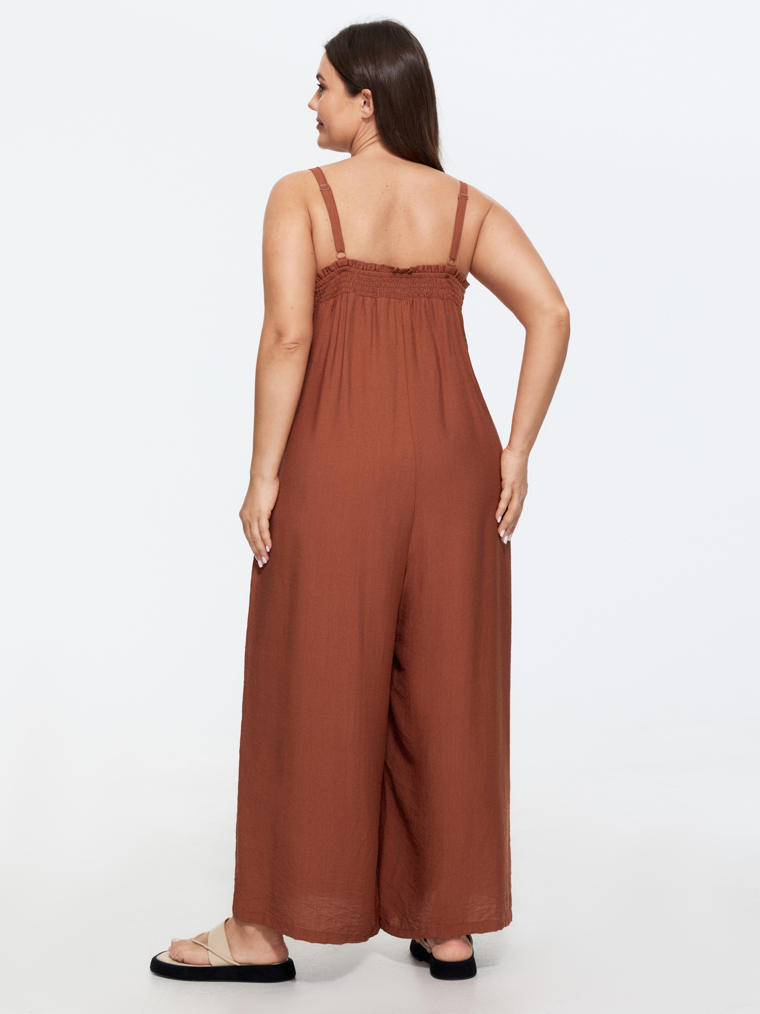 Side view of BloomChic Women's Plus Size Supersoft Shirred Sleeveless Plain Wide-Leg Jumpsuit Maroon Casual 22-24/3X