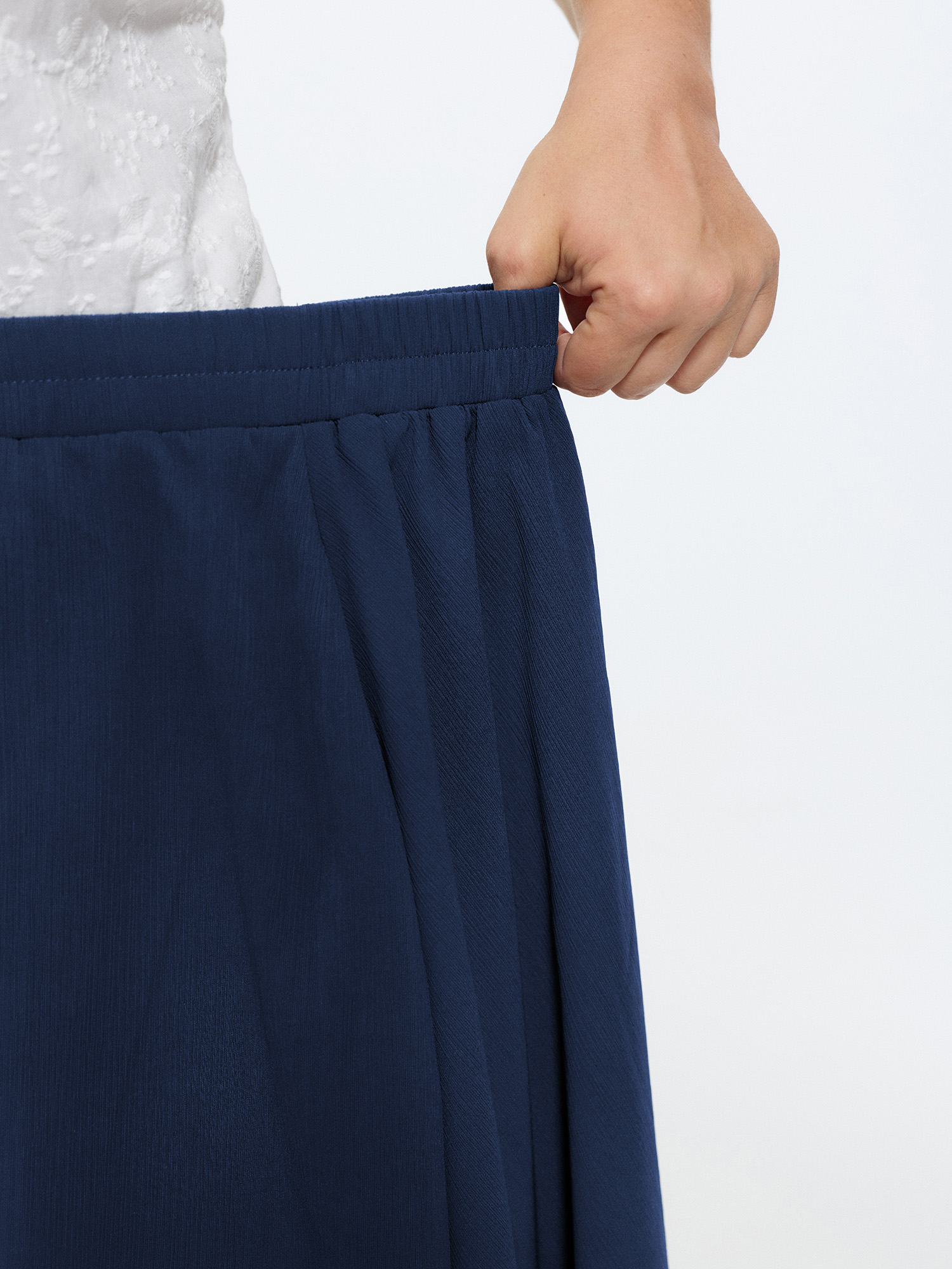 Side view of BloomChic Women's Plus Size Stretchy Sheer Layered Flowy Maxi Skirt DarkBlue Tiered Non Elegant 28/5X