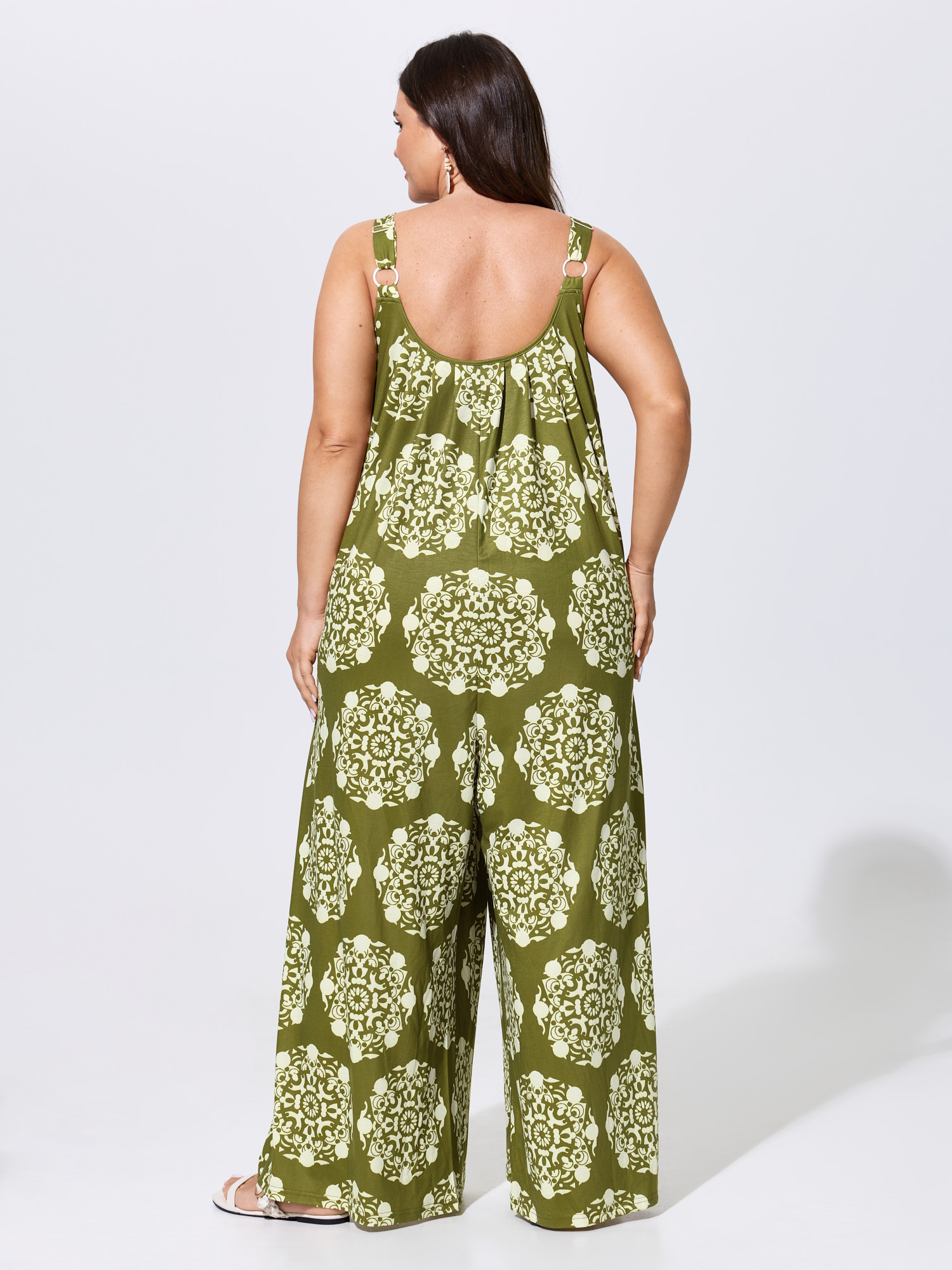 Side view of BloomChic Women's Plus Size Sunkissed Stretchy Adjustable Strap Jumpsuit Olive Vacation 10/M