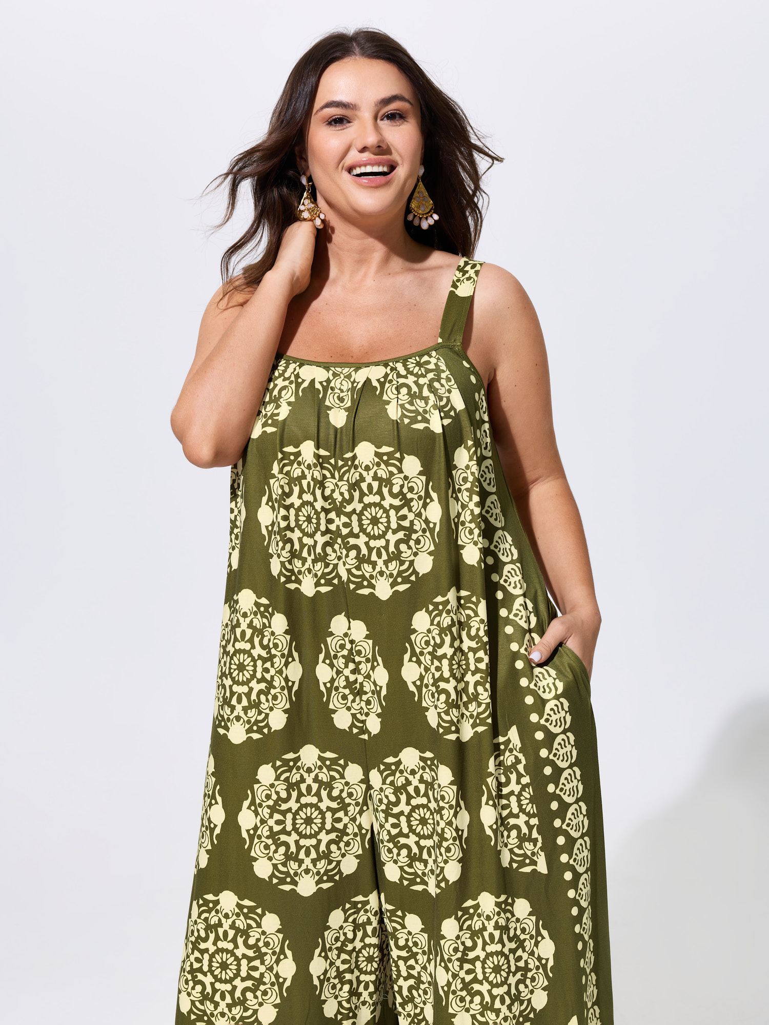 Side view of BloomChic Women's Plus Size Sunkissed Stretchy Adjustable Strap Jumpsuit ArmyGreen Vacation 22-24/3X