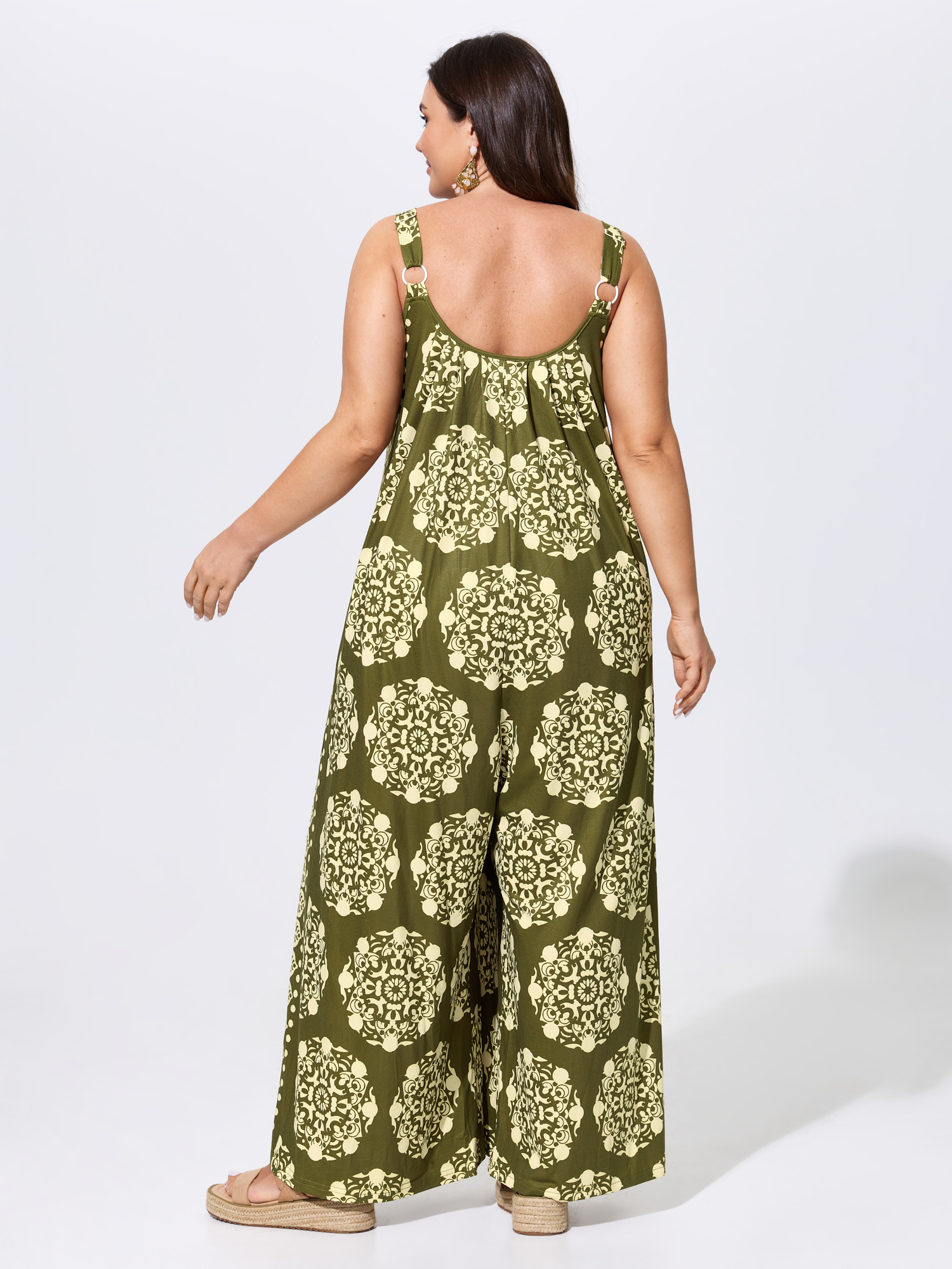 Side view of BloomChic Women's Plus Size Sunkissed Stretchy Adjustable Strap Jumpsuit ArmyGreen Vacation 22-24/3X