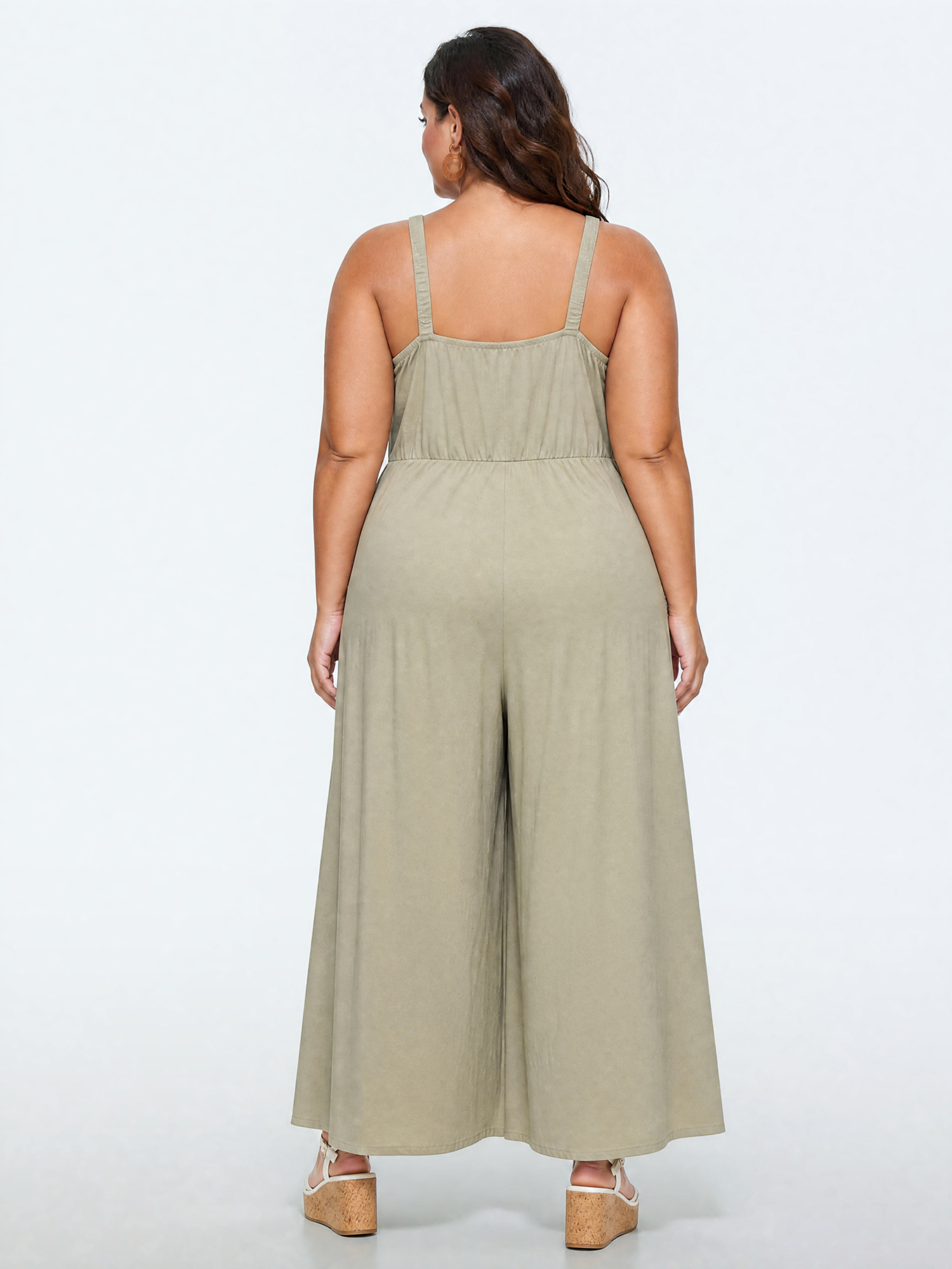 Side view of BloomChic Women's Plus Size Cotton Sleeveless Wide-Leg Jumpsuit Champagne Casual 12/L