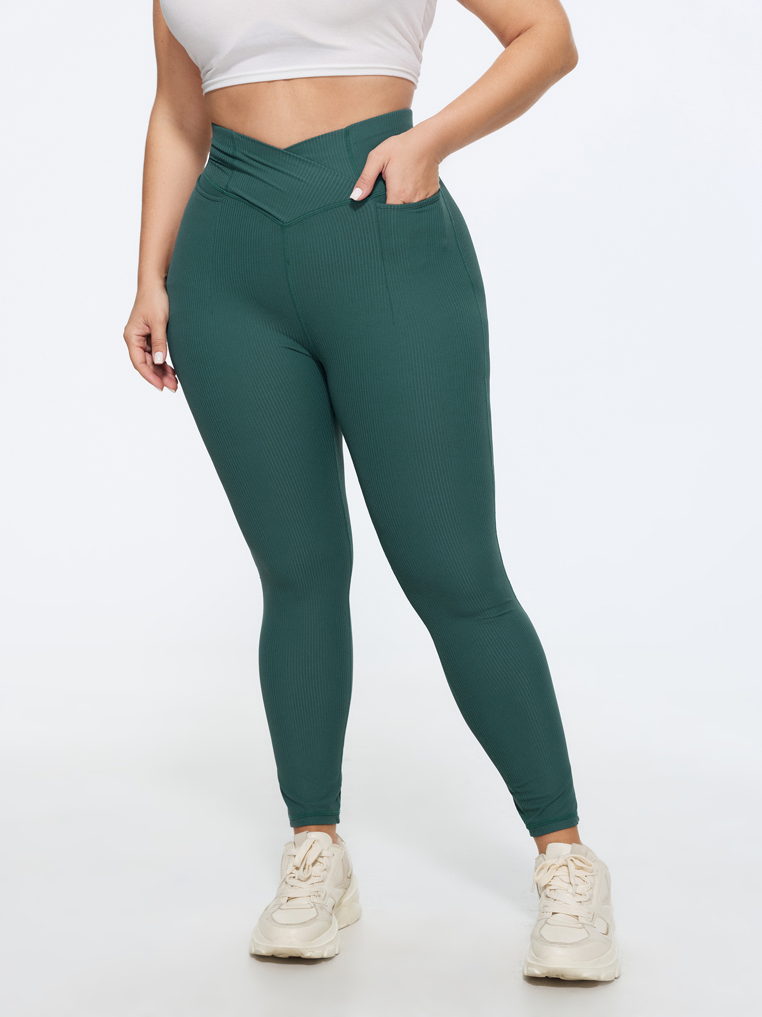 BloomChic Women's Plus Size Stretchy Overlap Waist Textured Pocket Leggings Emerald Skinny fit Mid Rise 10/M