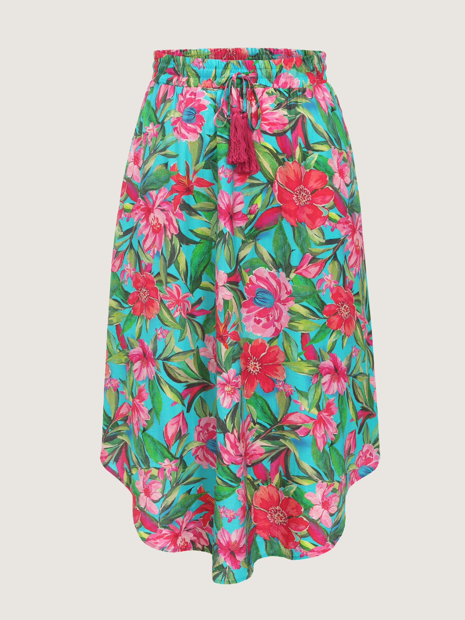 Side view of BloomChic Women's Plus Size Floral Print Drawstring Waist Arc Hem Maxi Skirt Emerald Wide Waistband Flared Vacation 30/6X
