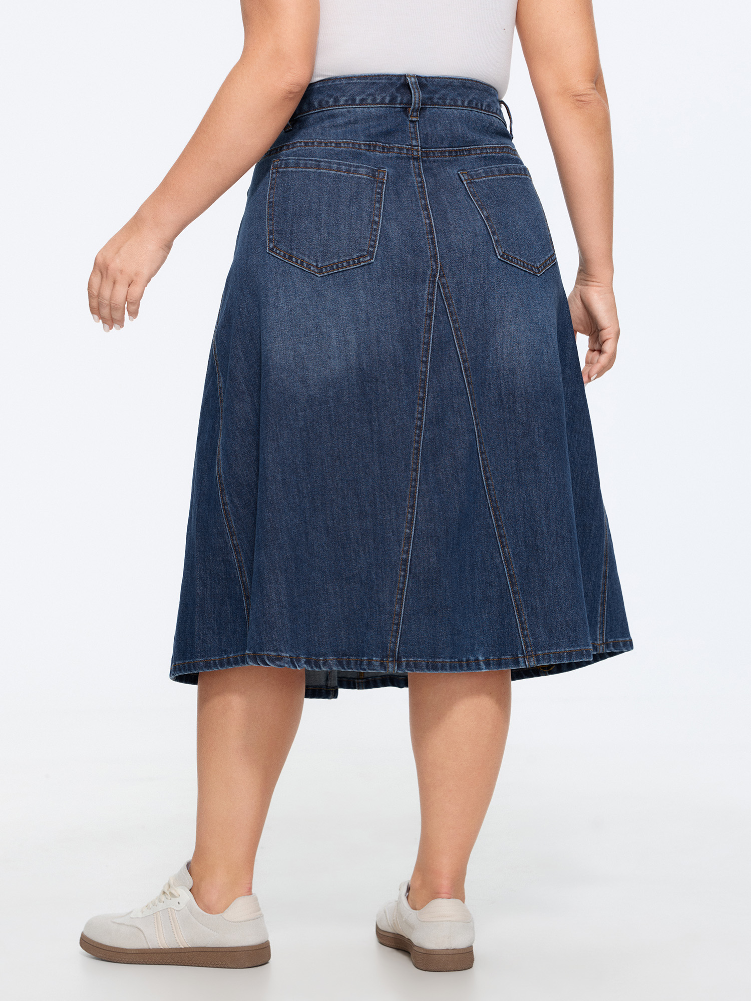 Side view of BloomChic Women's Plus Size Stretchy Seamed Mid-Rise Denim Skirt Denimblue Non Casual High Rise 12/L