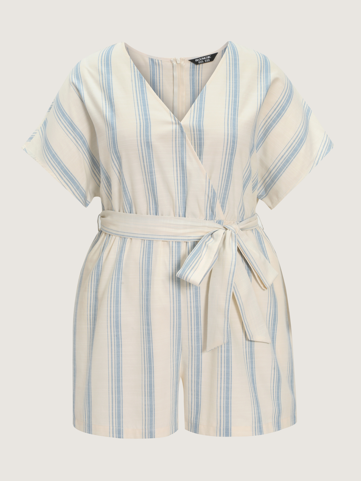 Side view of BloomChic Women's Plus Size Striped Print Stretchy Waist-Tie Romper LightBlue Vacation 12/L