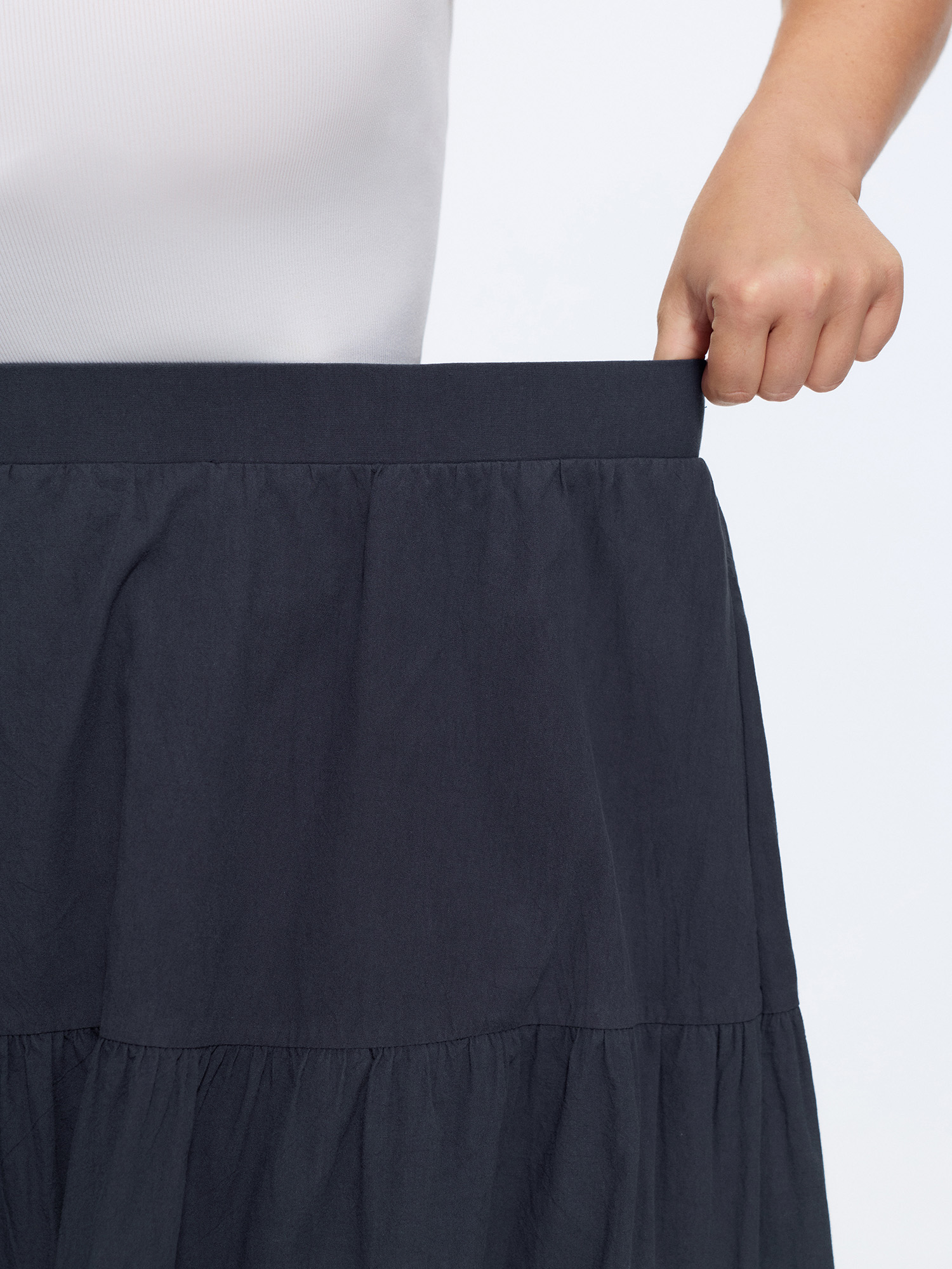 Side view of BloomChic Women's Plus Size Cotton Lace Trim Tiered Flowy Maxi Skirt Indigo Lace Trim Flared Casual 10/M