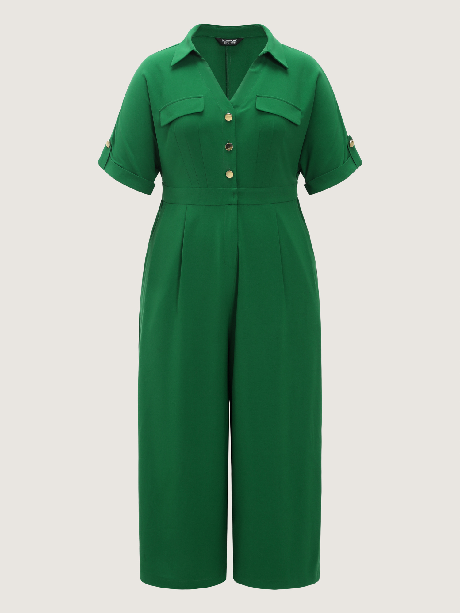 Side view of BloomChic Women's Plus Size Button Placket Pockets Wide-Leg Jumpsuit Emerald Office 10/M