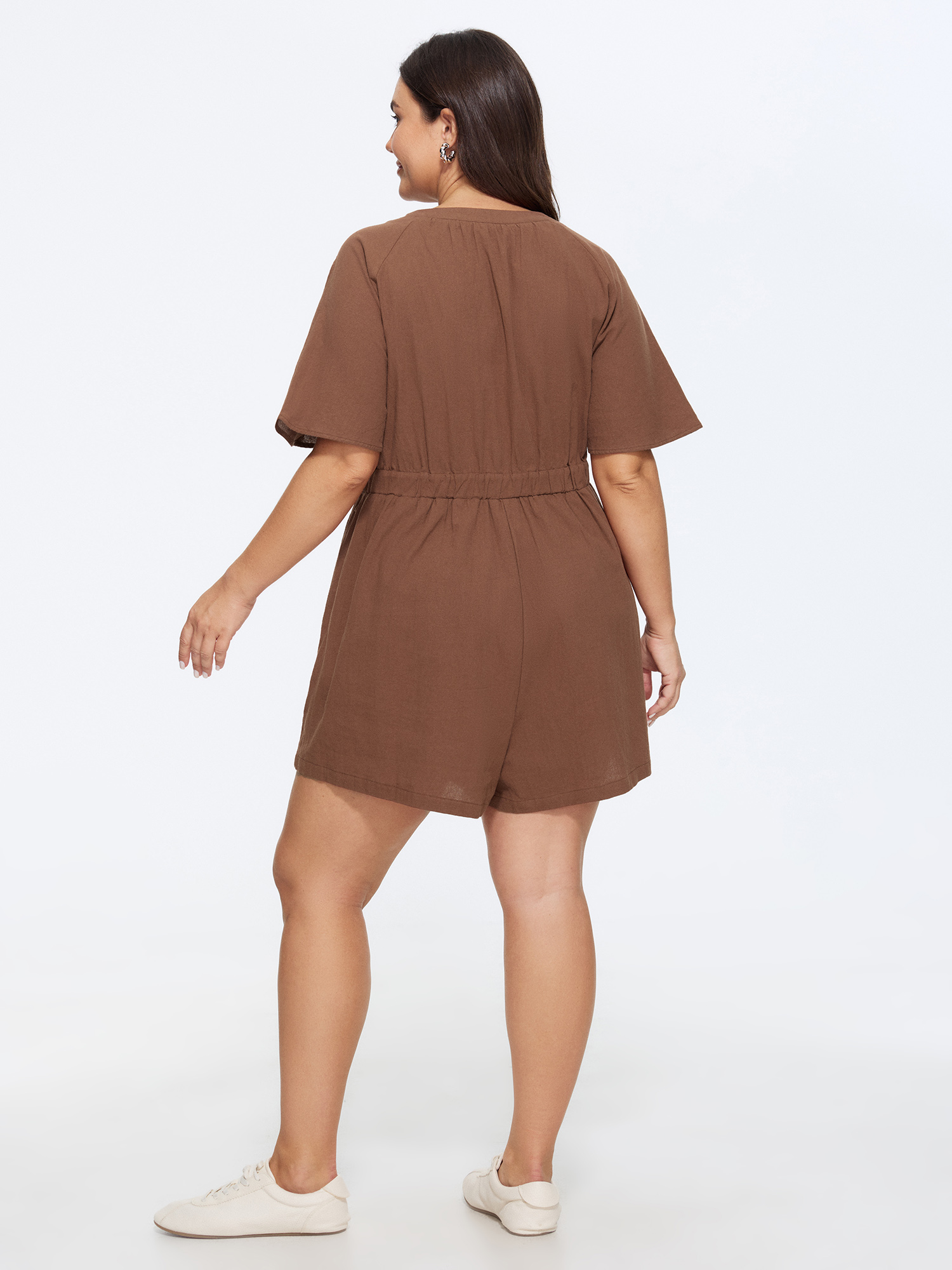 Side view of BloomChic Women's Plus Size Cotton Split Neckline Pockets Romper Yellowishbrown Casual 30/6X