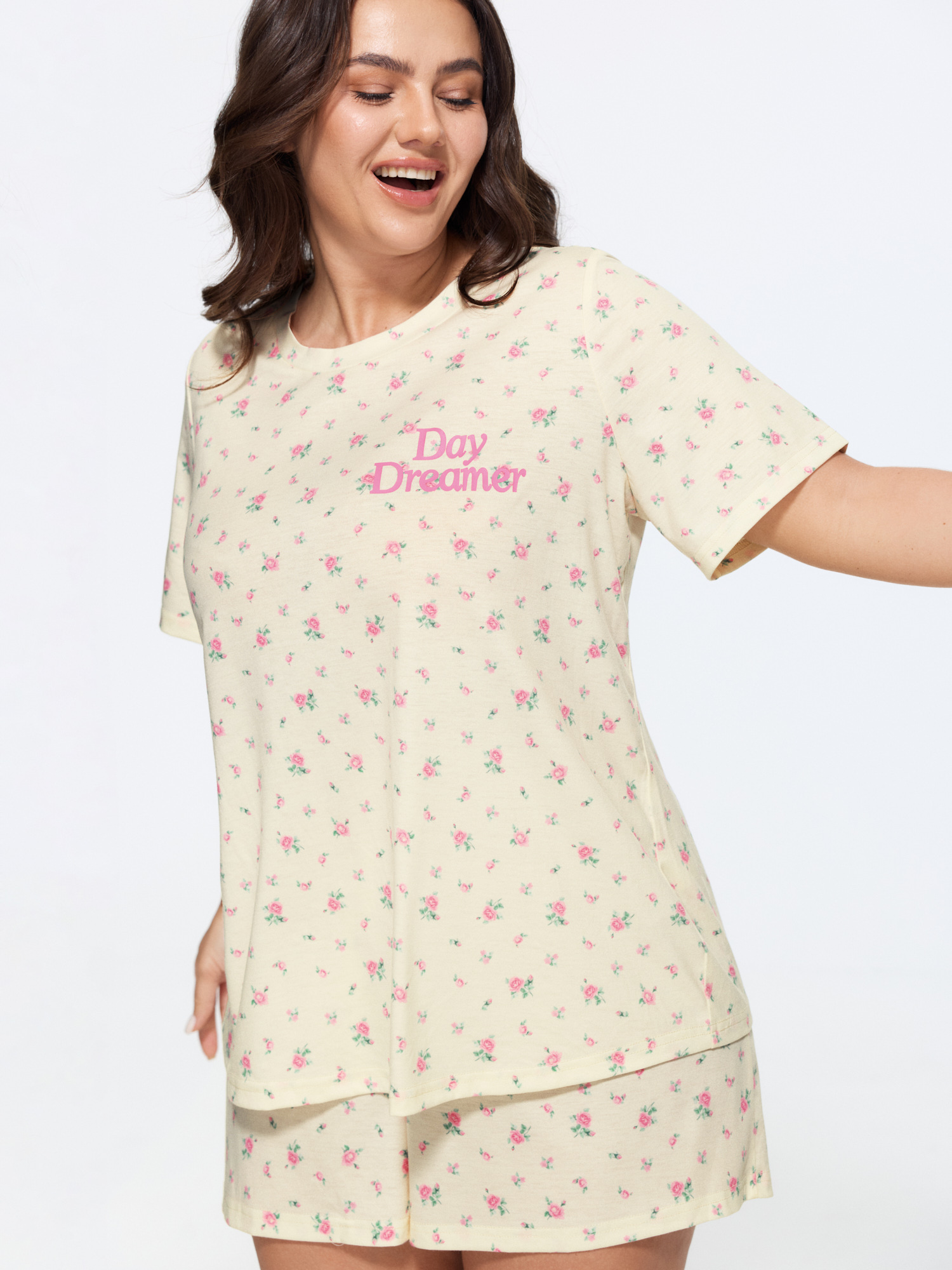 Side view of BloomChic Women's Plus Size Day Dreamer Stretchy Pajama Set Ivory Text 14-16/1X
