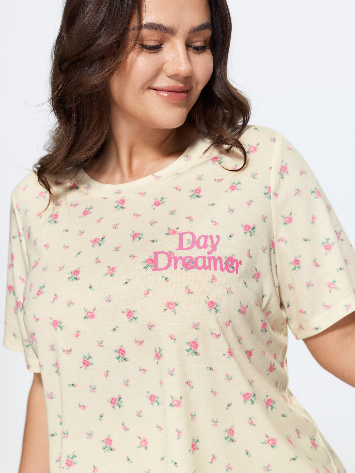 Side view of BloomChic Women's Plus Size Day Dreamer Stretchy Pajama Set Ivory Text 14-16/1X