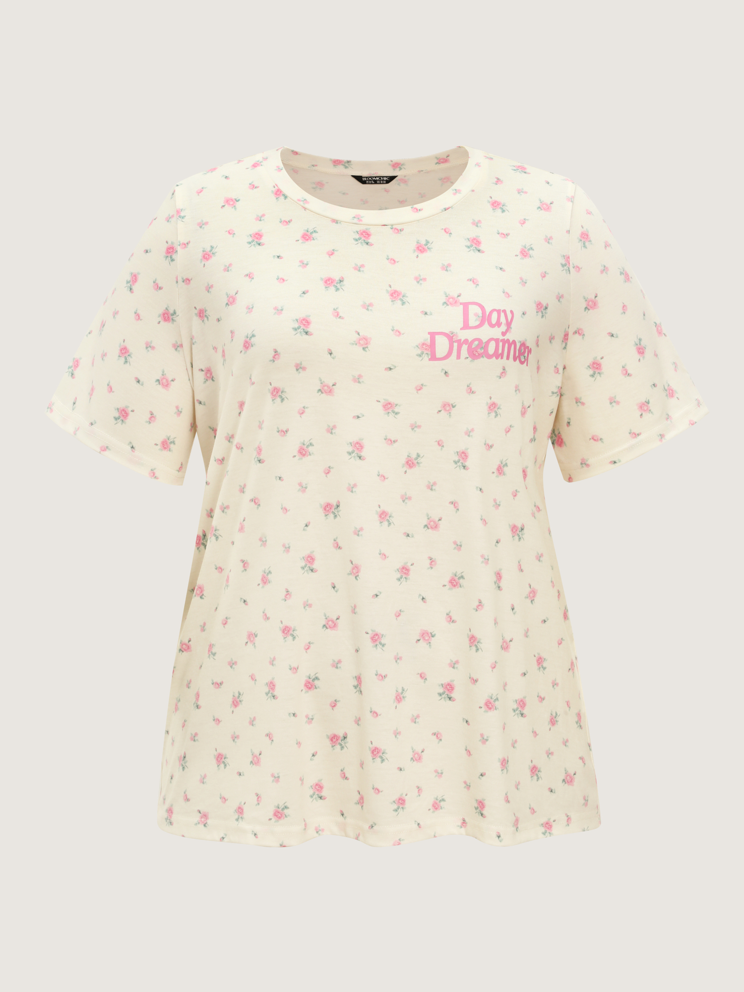 Side view of BloomChic Women's Plus Size Day Dreamer Stretchy Pajama Set Ivory Text 14-16/1X