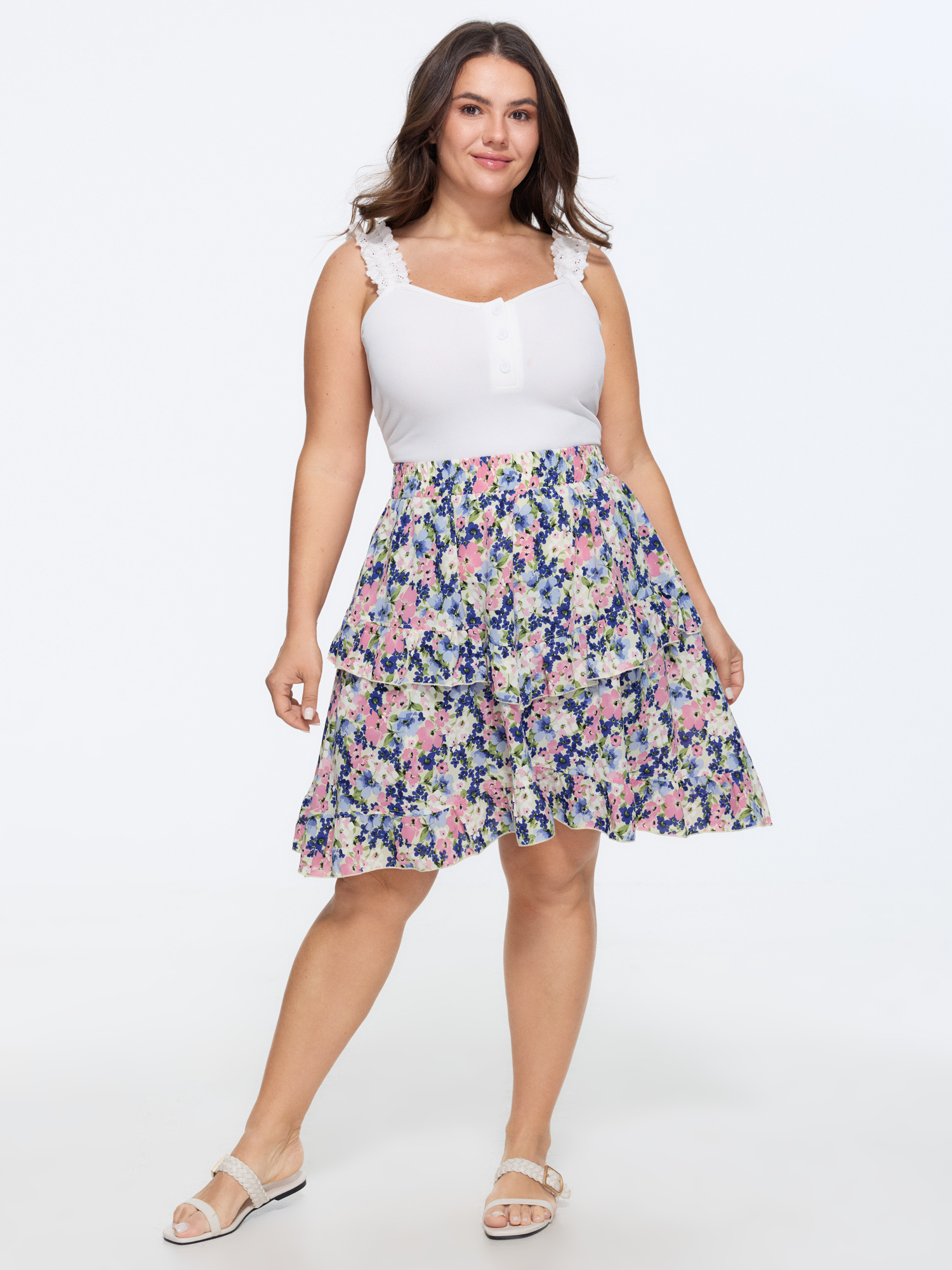 Side view of BloomChic Women's Plus Size Floral Print Ruffled Edge Mini Skirt Navy Casual 14-16/1X
