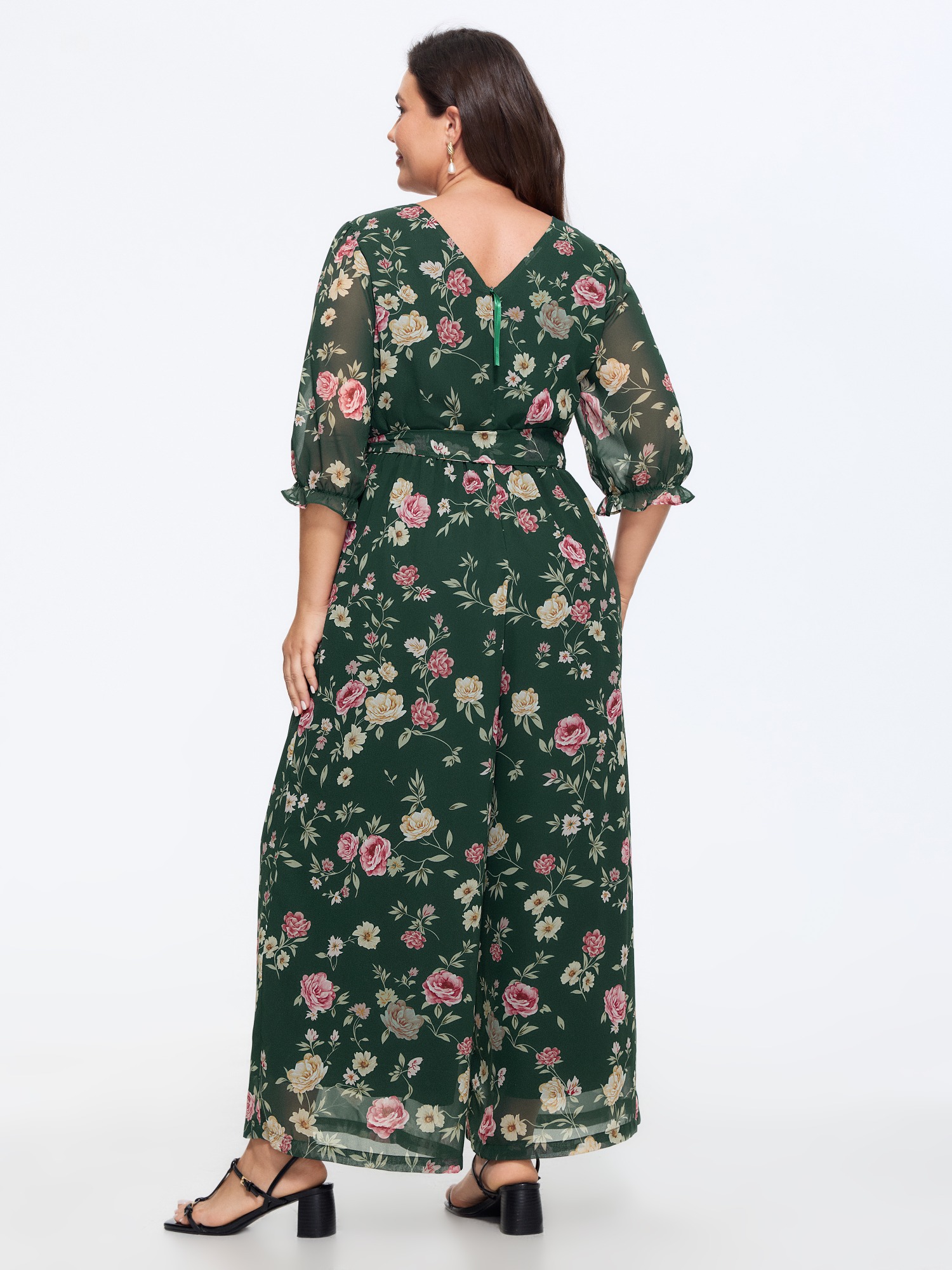 Side view of BloomChic Women's Plus Size Floral Print Stretchy Waist Drawstring Jumpsuit DarkGreen Elegant 30/6X