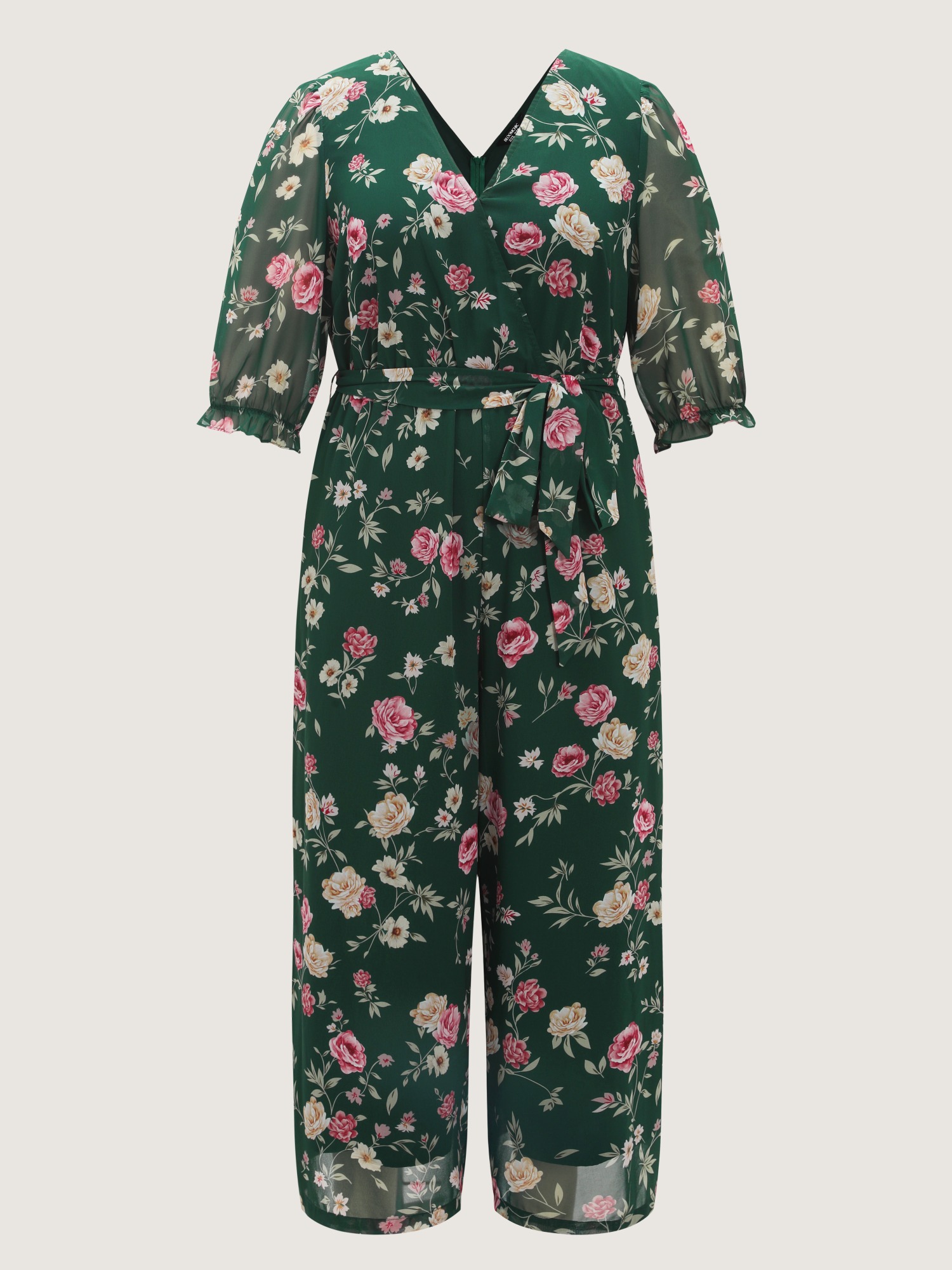 Side view of BloomChic Women's Plus Size Floral Print Stretchy Waist Drawstring Jumpsuit DarkGreen Elegant 30/6X