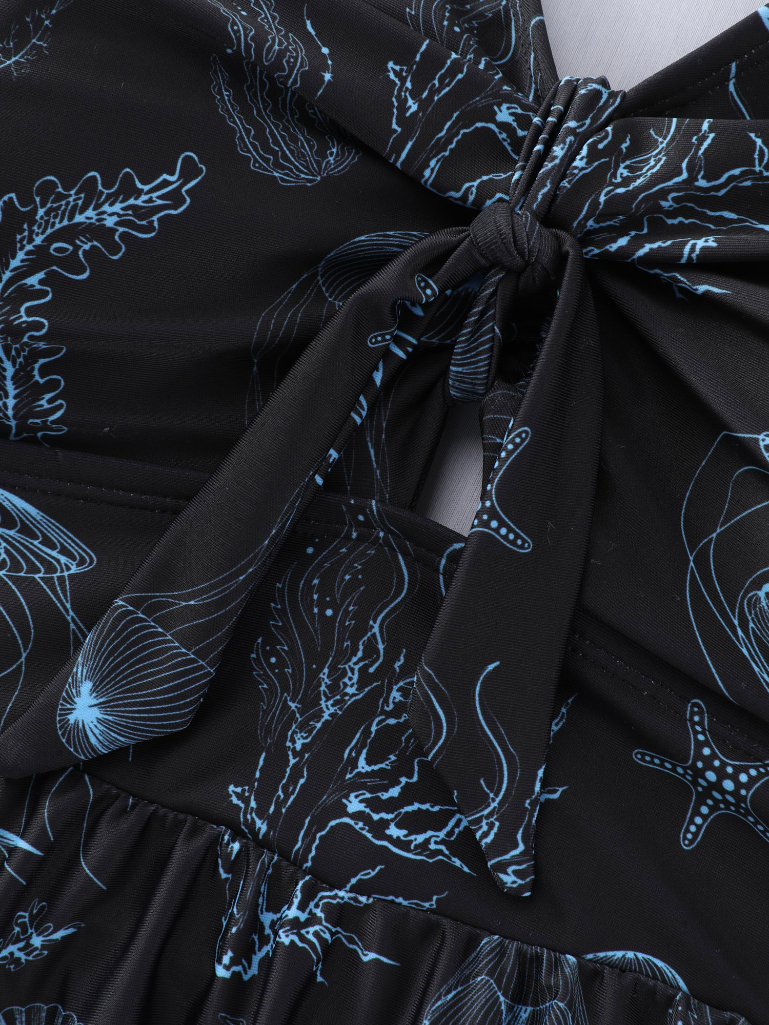 Side view of BloomChic Women's Plus Size Jellyfish Print Pockets Flowy Swim Dress Black Marine Elements Lace-Up Adjustable Straps 14-16/1X